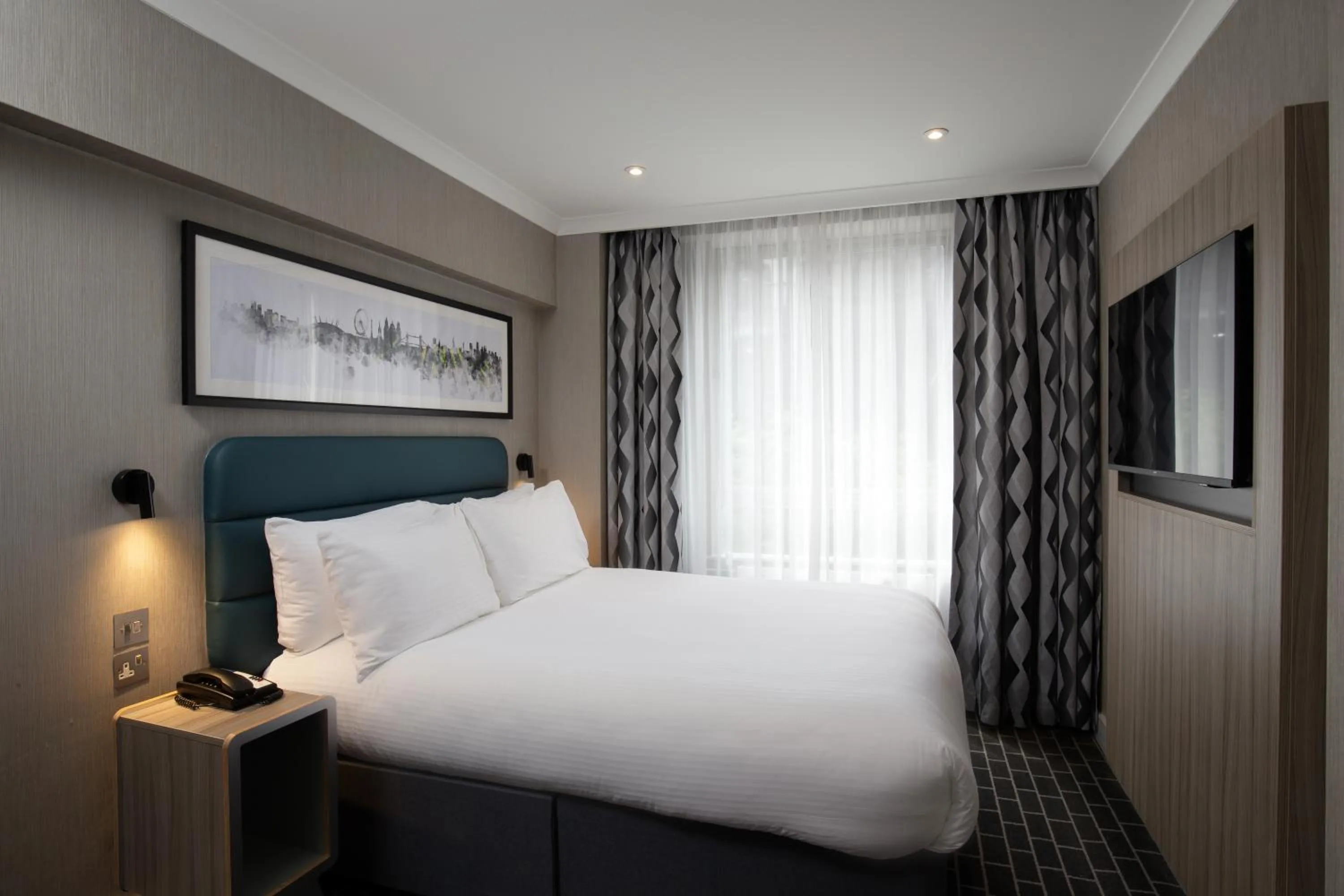 Bed in City Sleeper at Royal National Hotel