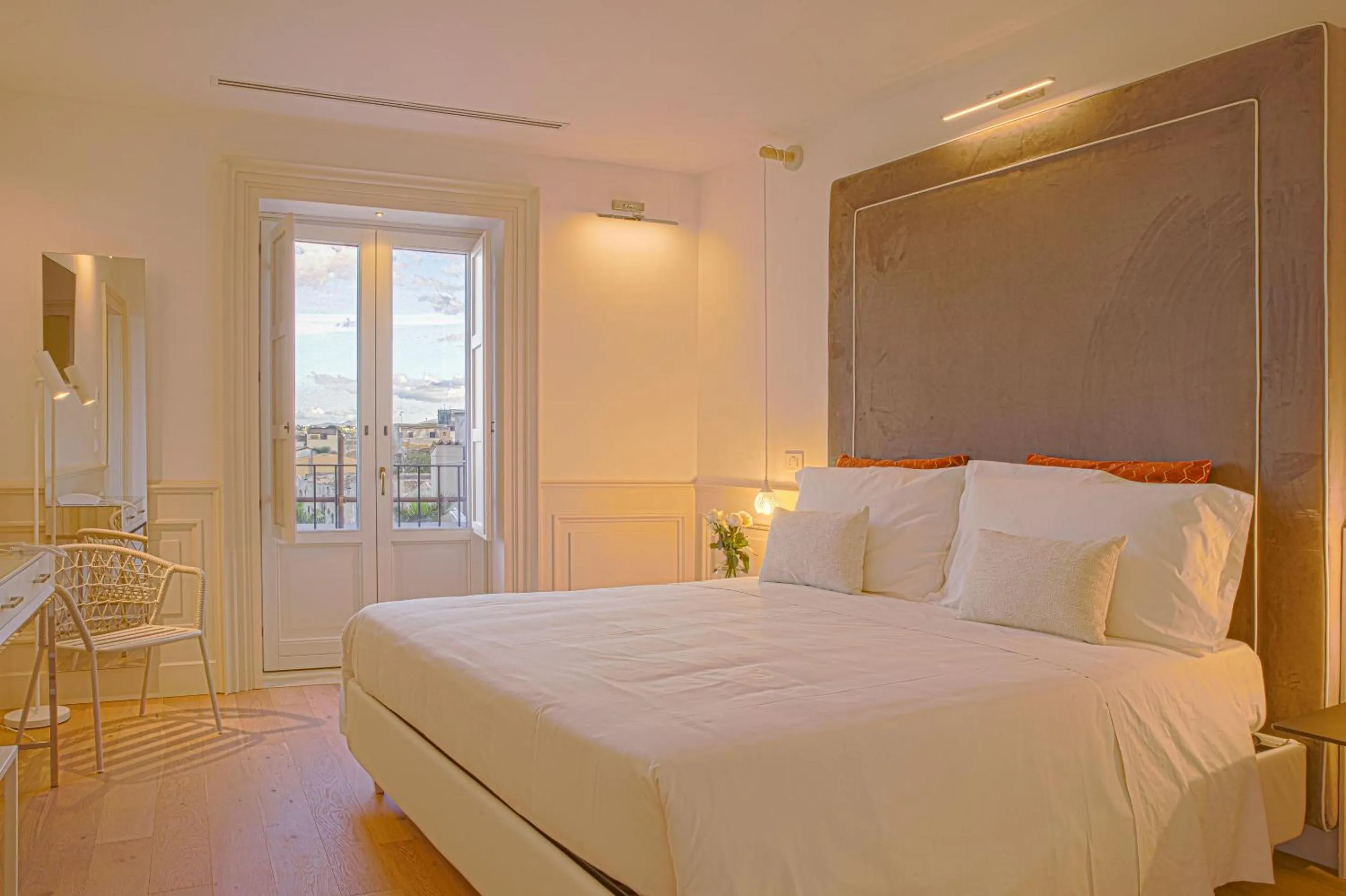 Bed in Costamante Suites & Spa