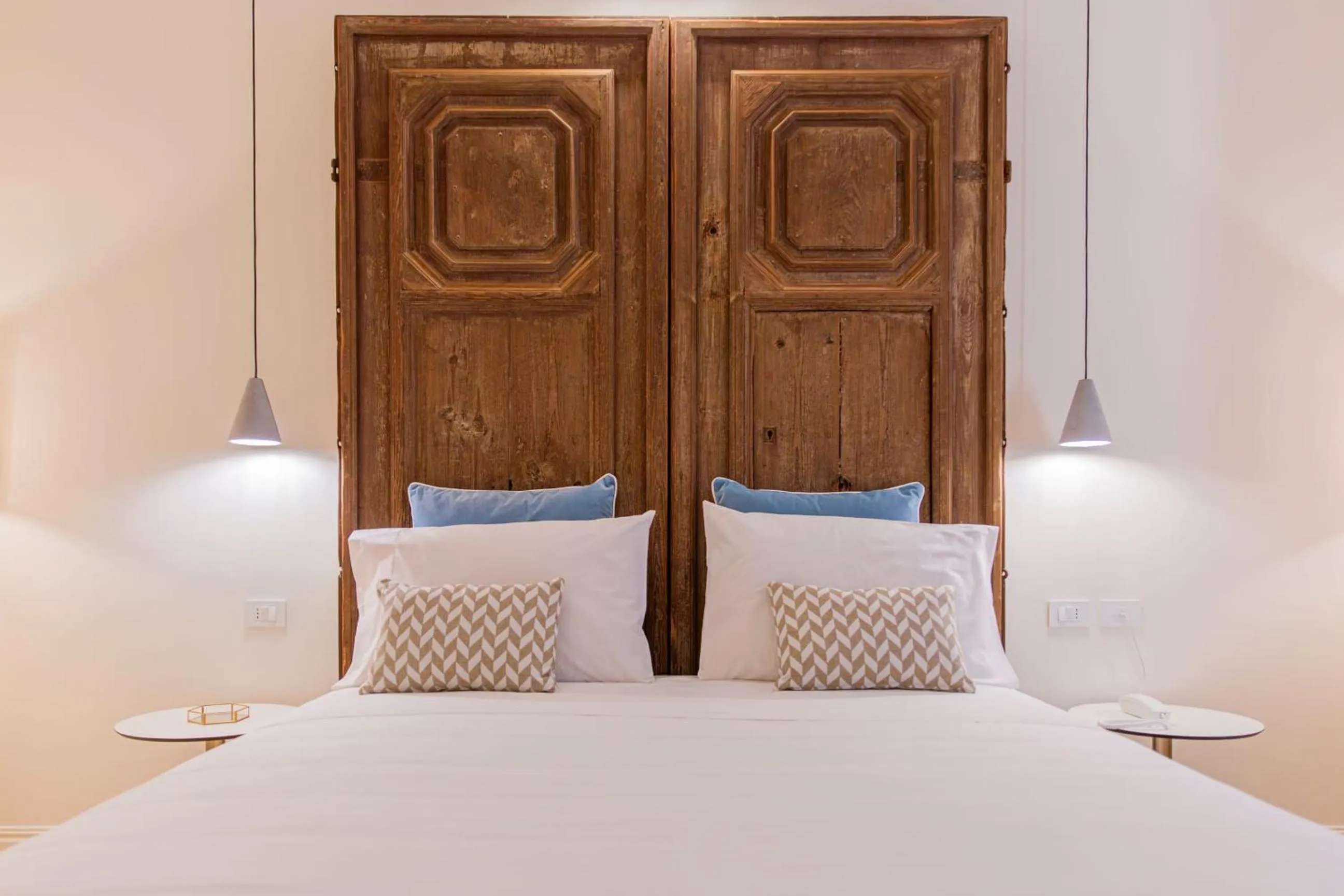 Bed in Costamante Suites & Spa