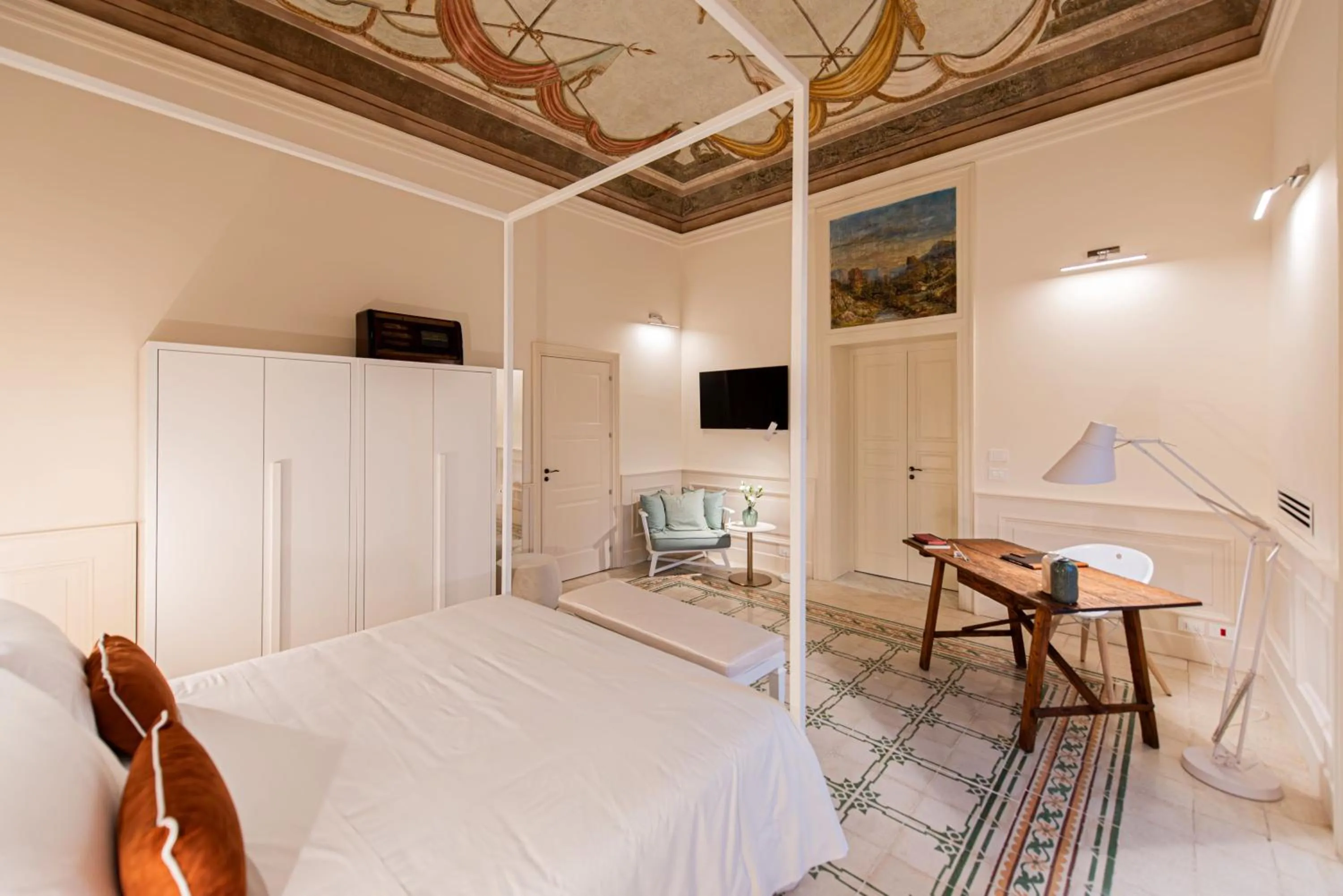 Bed in Costamante Suites & Spa