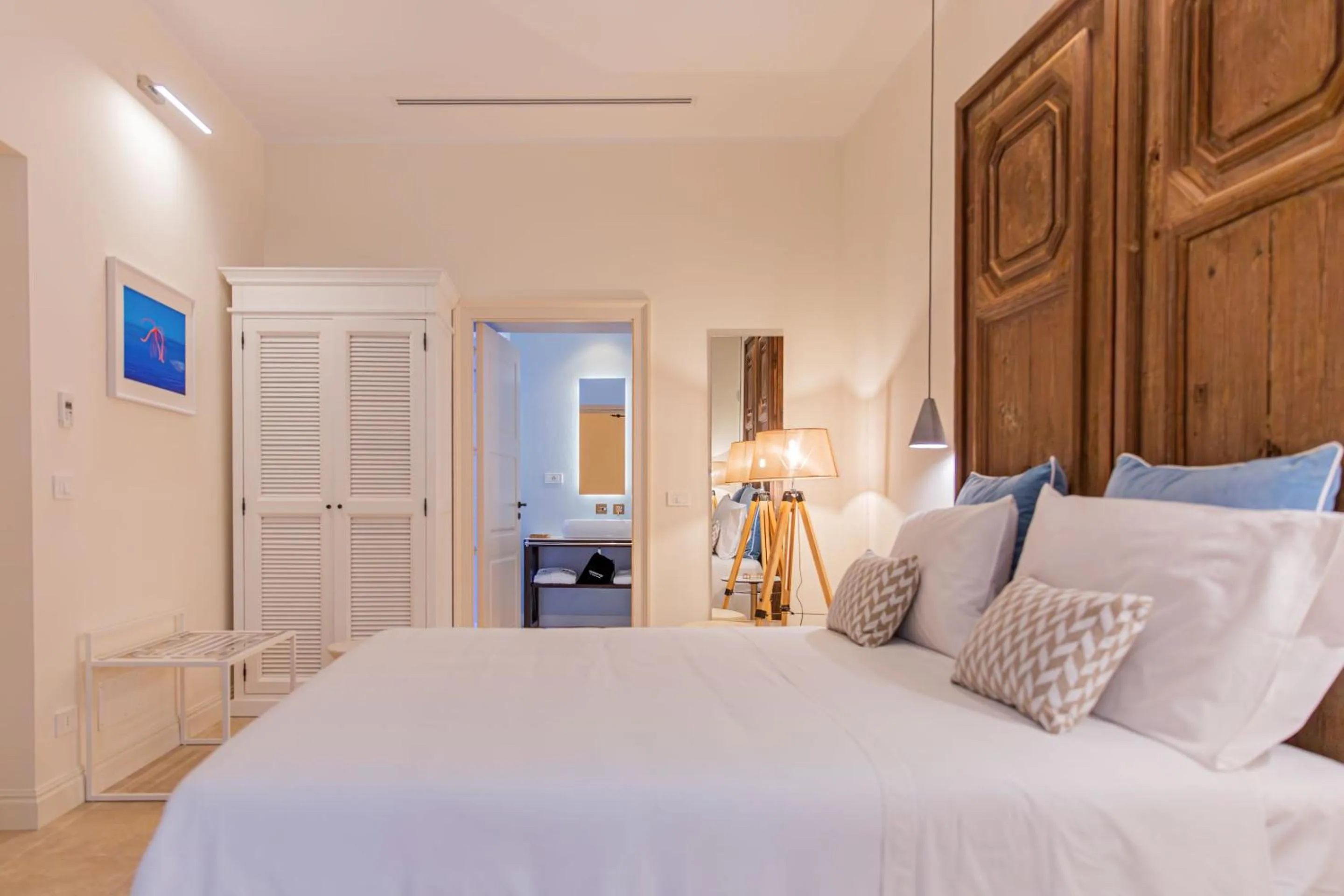 Bed in Costamante Suites & Spa