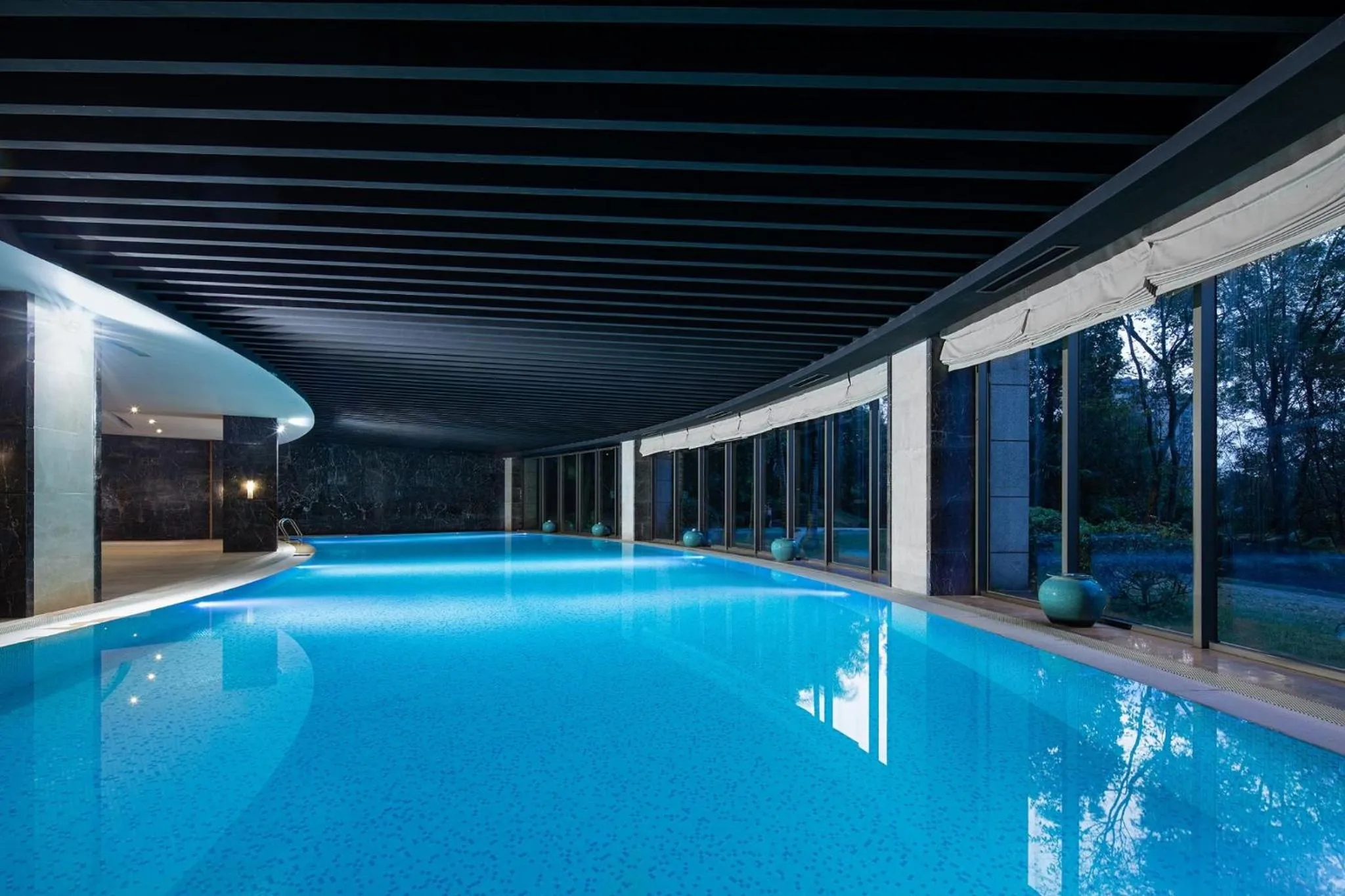 Swimming pool in Crowne Plaza Chongqing New North Zone by IHG