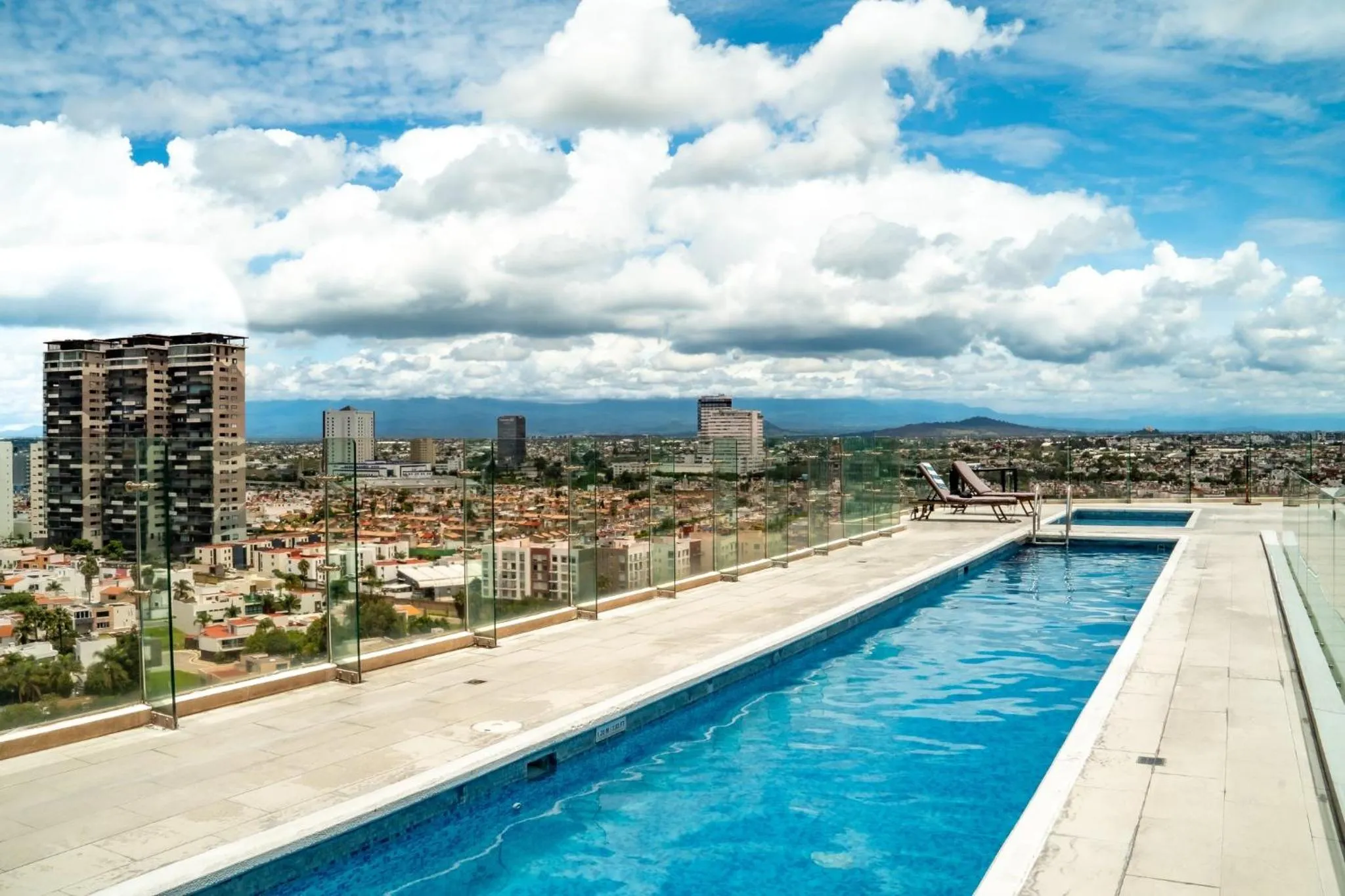 Swimming pool in Holiday Inn Express & Suites Puebla Angelopolis by IHG