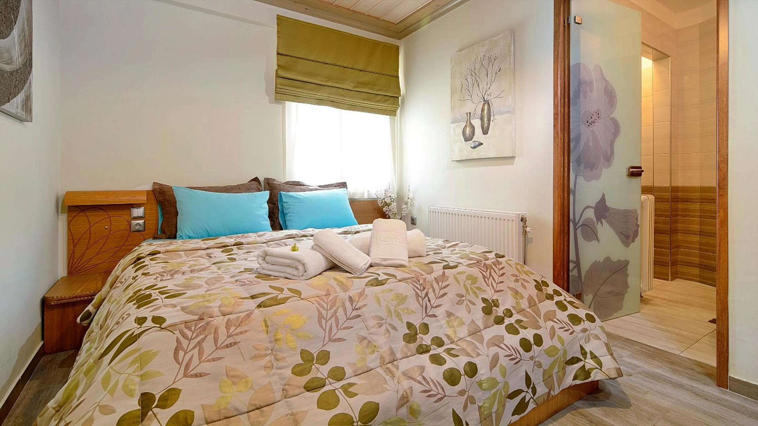 Bed in Dilofo Hotel Luxury Suites