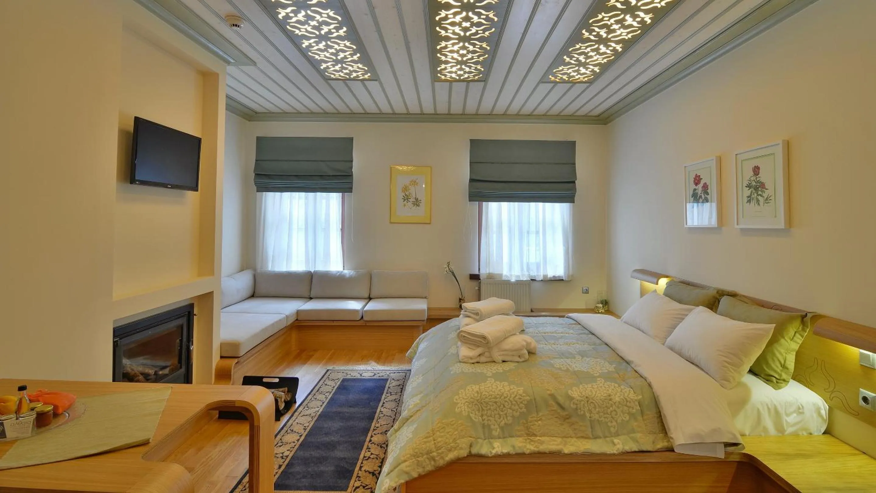 Bed in Dilofo Hotel Luxury Suites