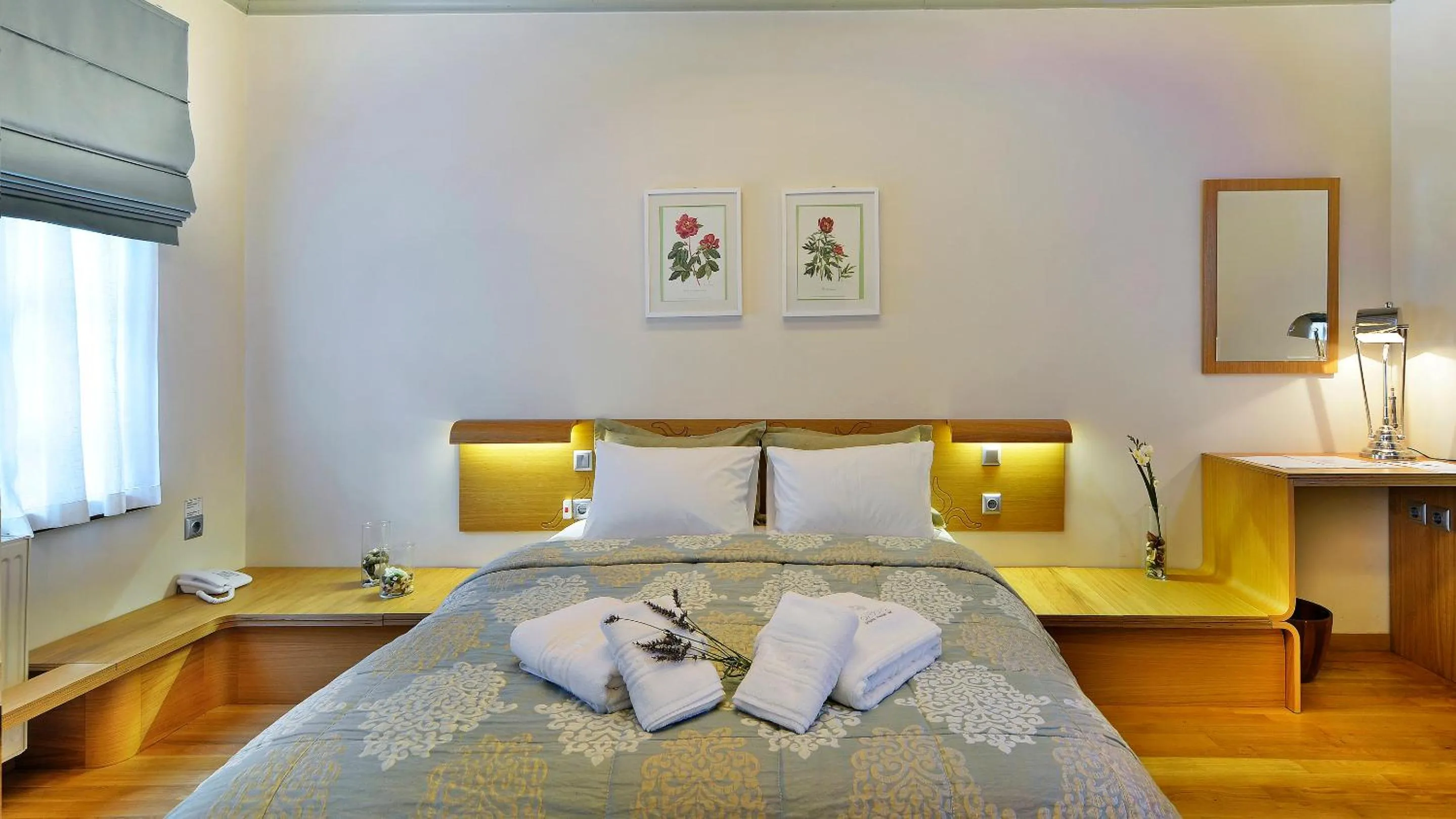 Bed in Dilofo Hotel Luxury Suites