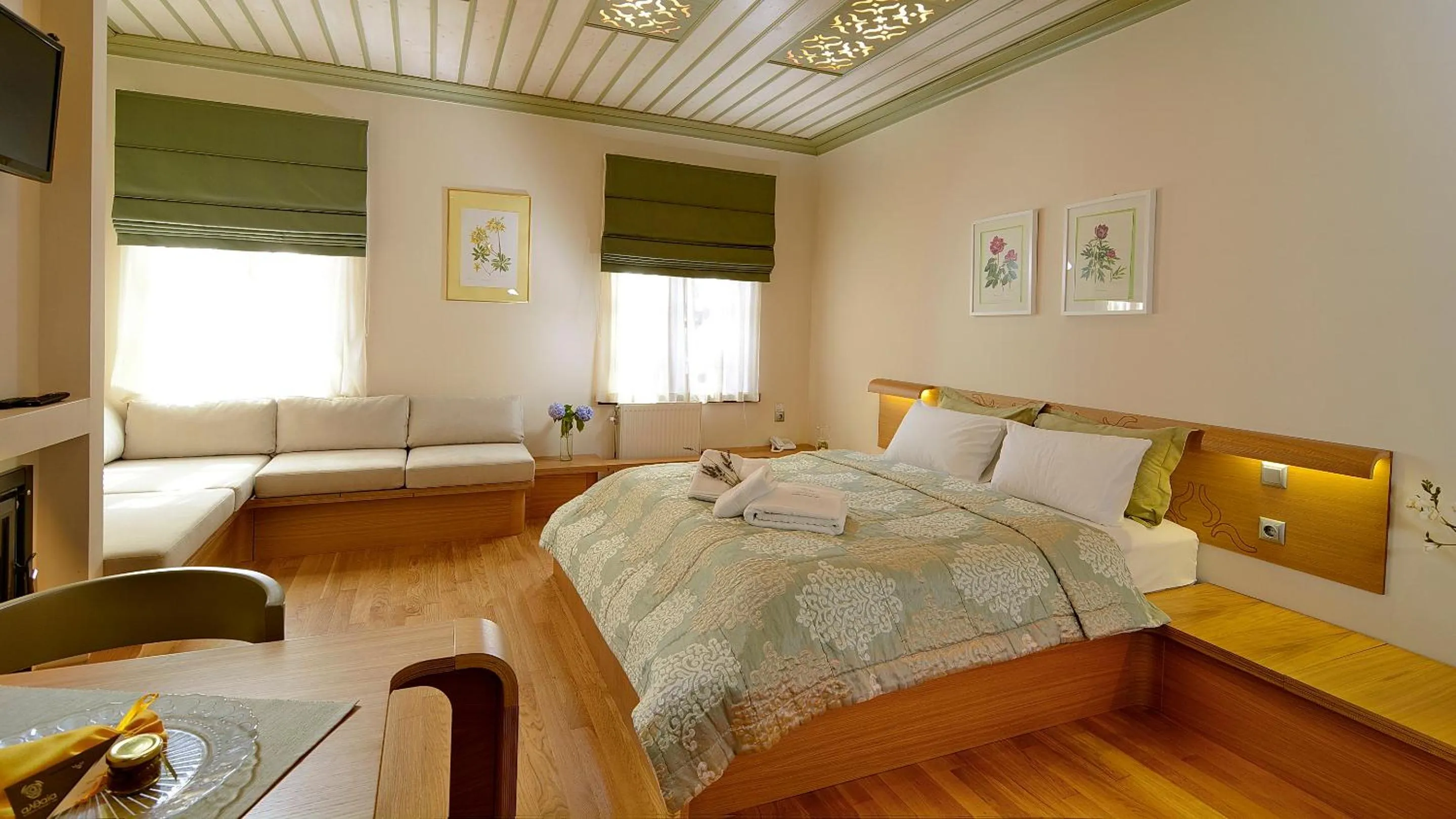 Seating area, Bed in Dilofo Hotel Luxury Suites