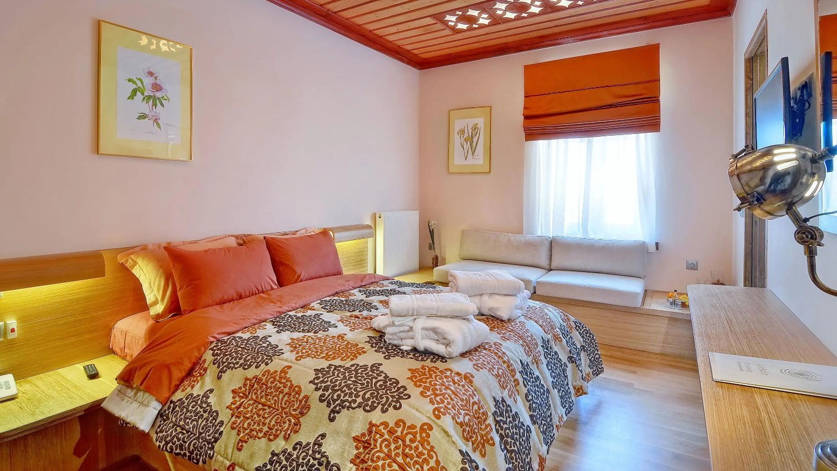 Bed in Dilofo Hotel Luxury Suites