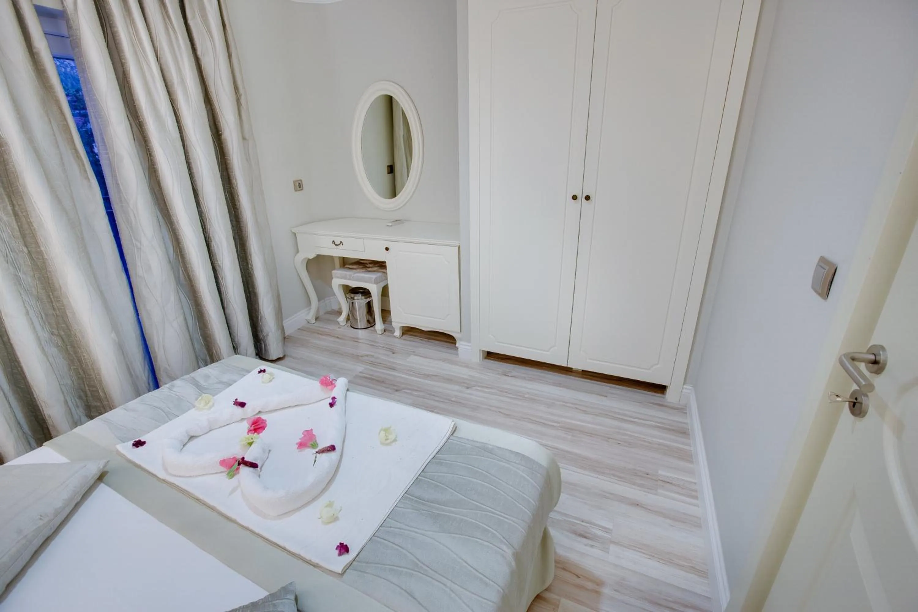 Bed in Pinehill Hotel & Suites