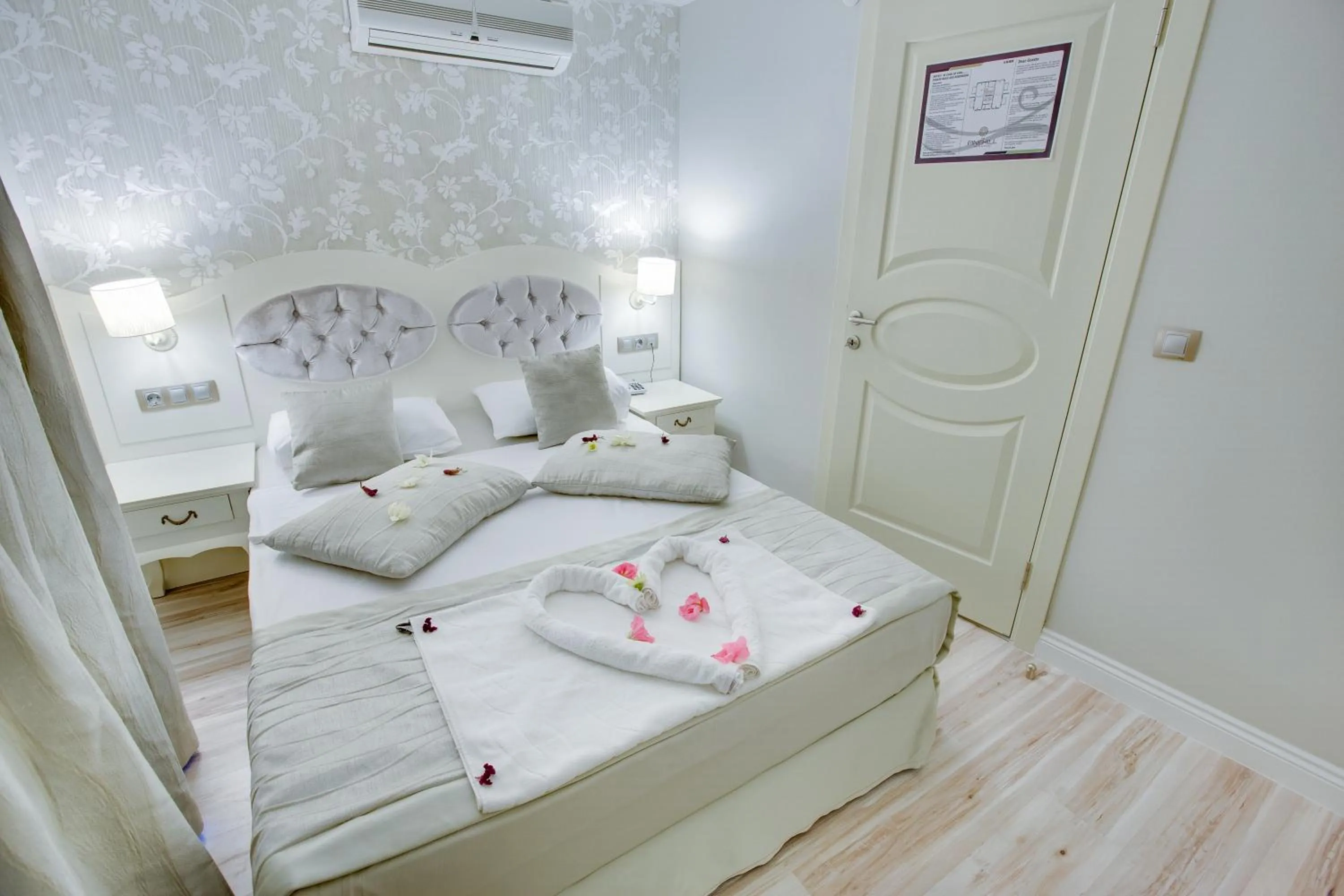 Bed in Pinehill Hotel & Suites