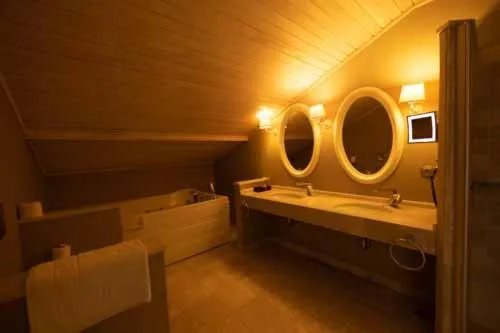 Bathroom, Bed in Pinehill Hotel & Suites