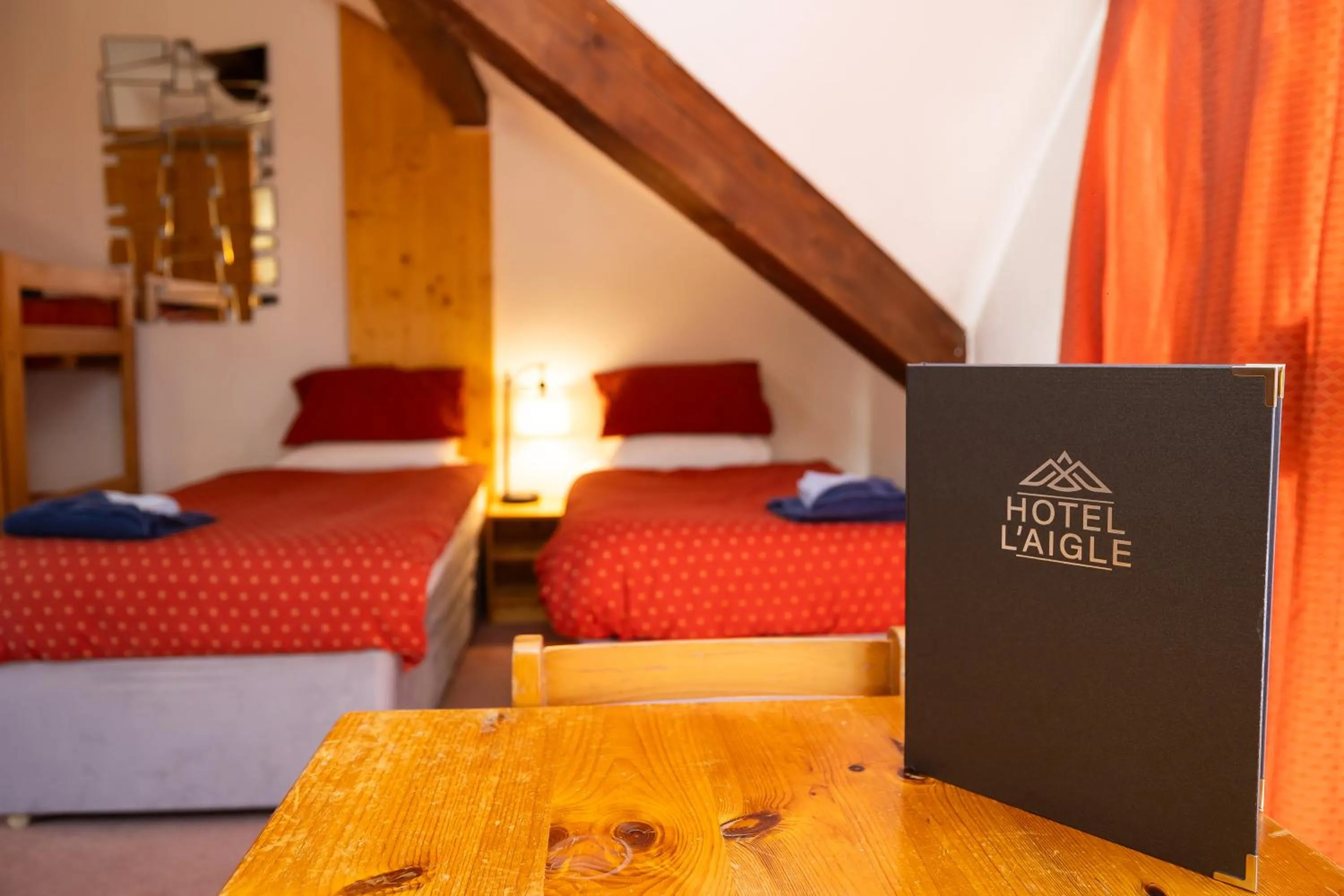 Bed in Hotel l'Aigle