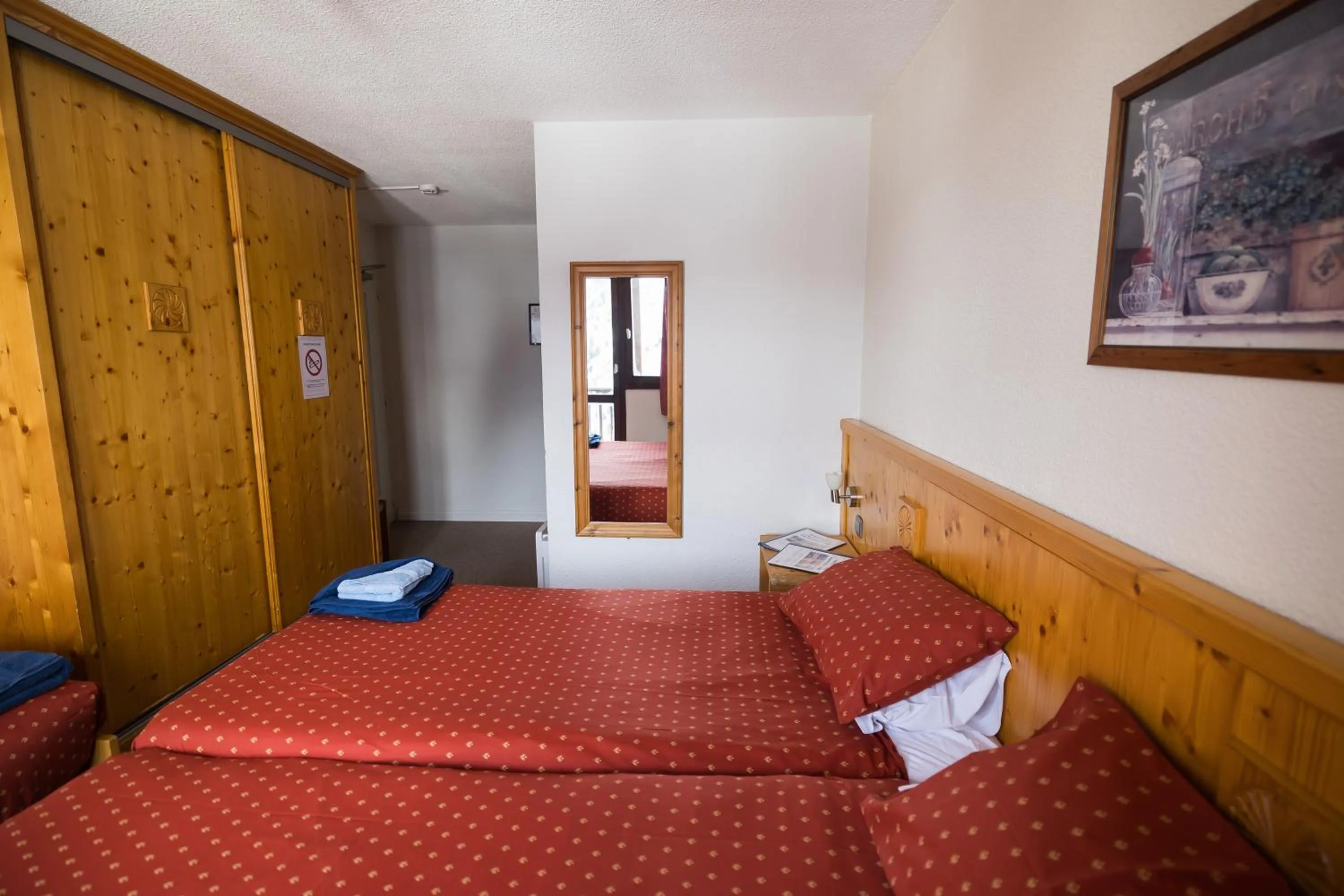 Bed in Hotel l'Aigle