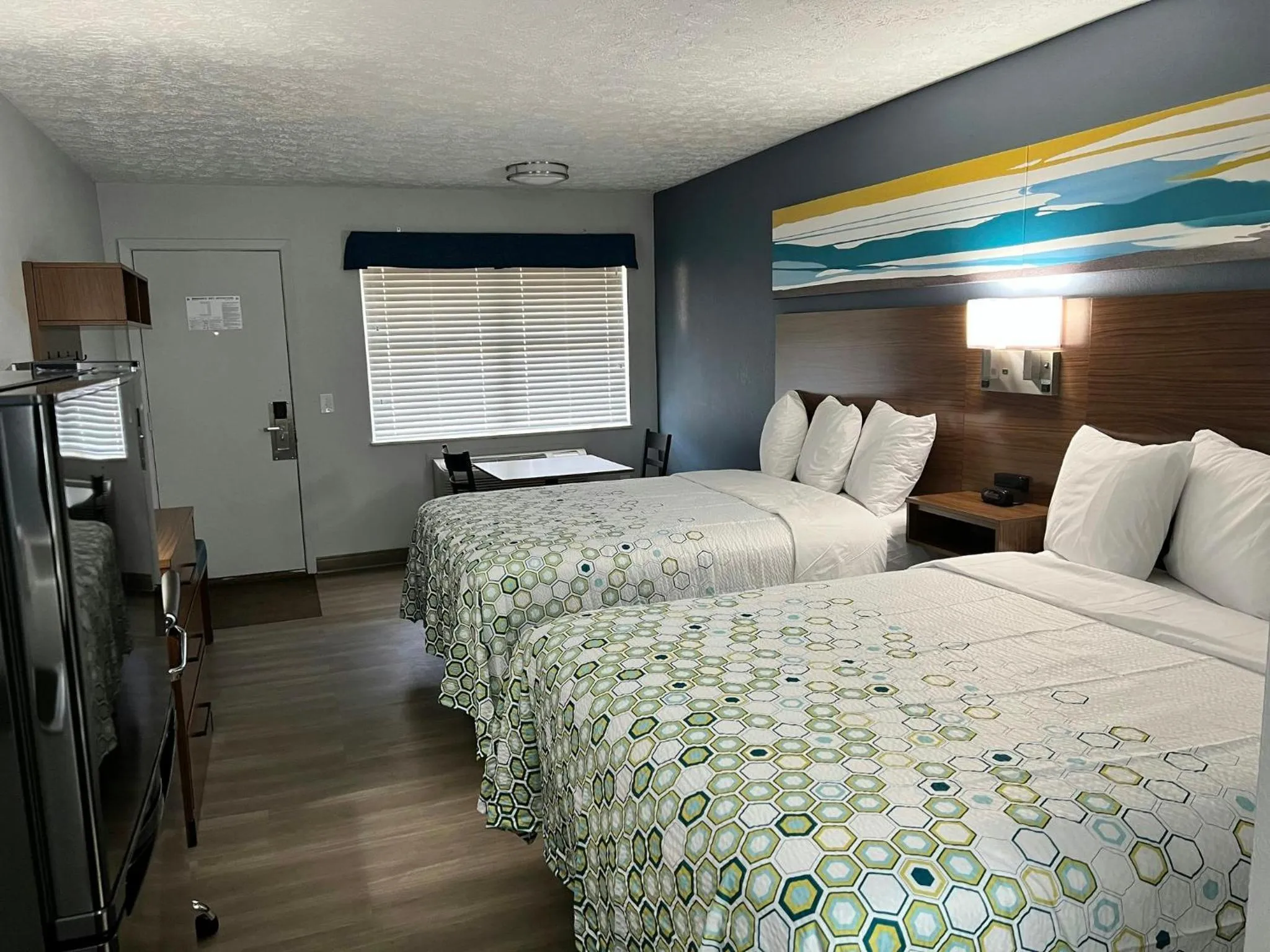 Photo of the whole room, Bed in HomeTowne Studios by Red Roof Georgetown, KY