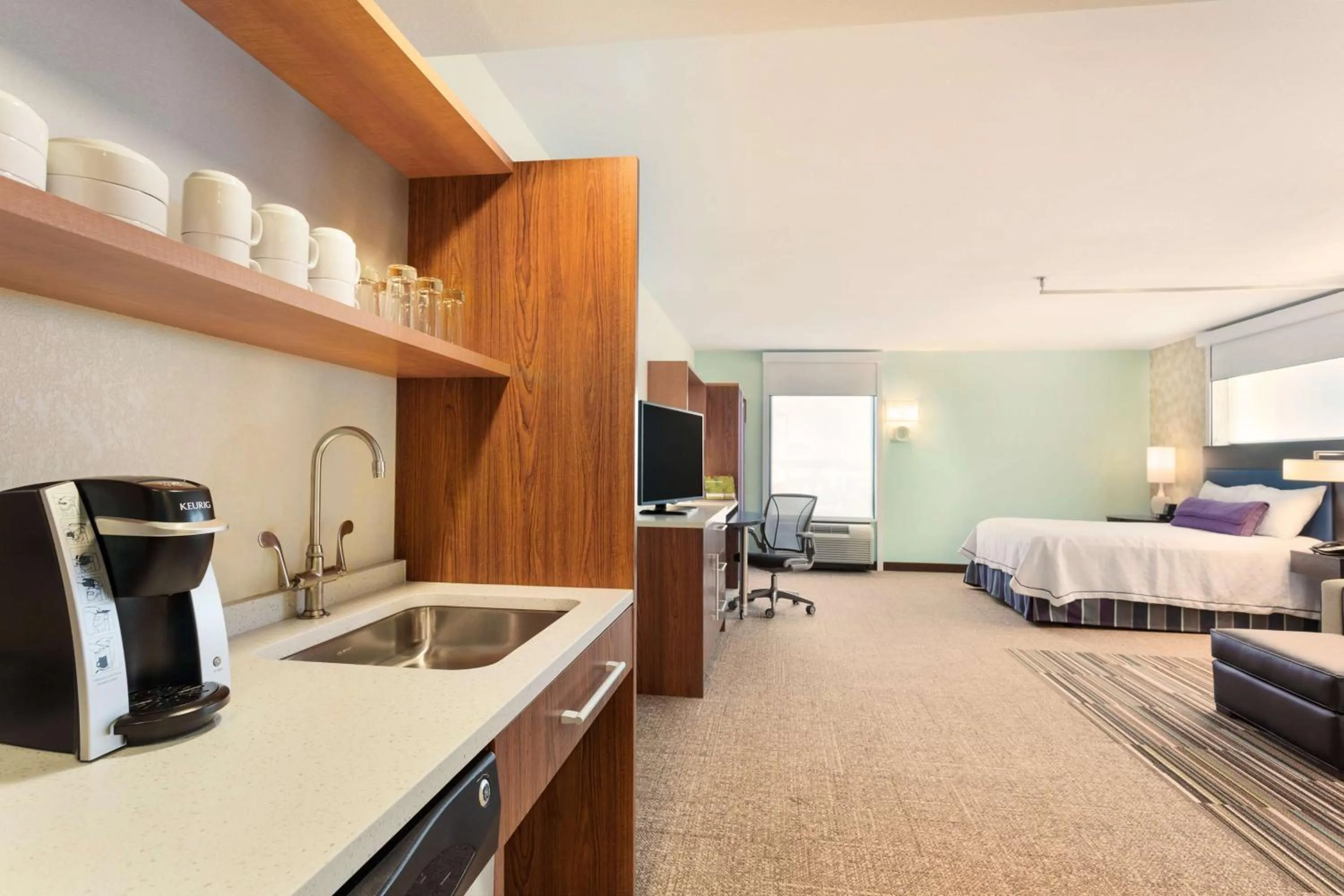 Bed in Home2 Suites by Hilton Fargo