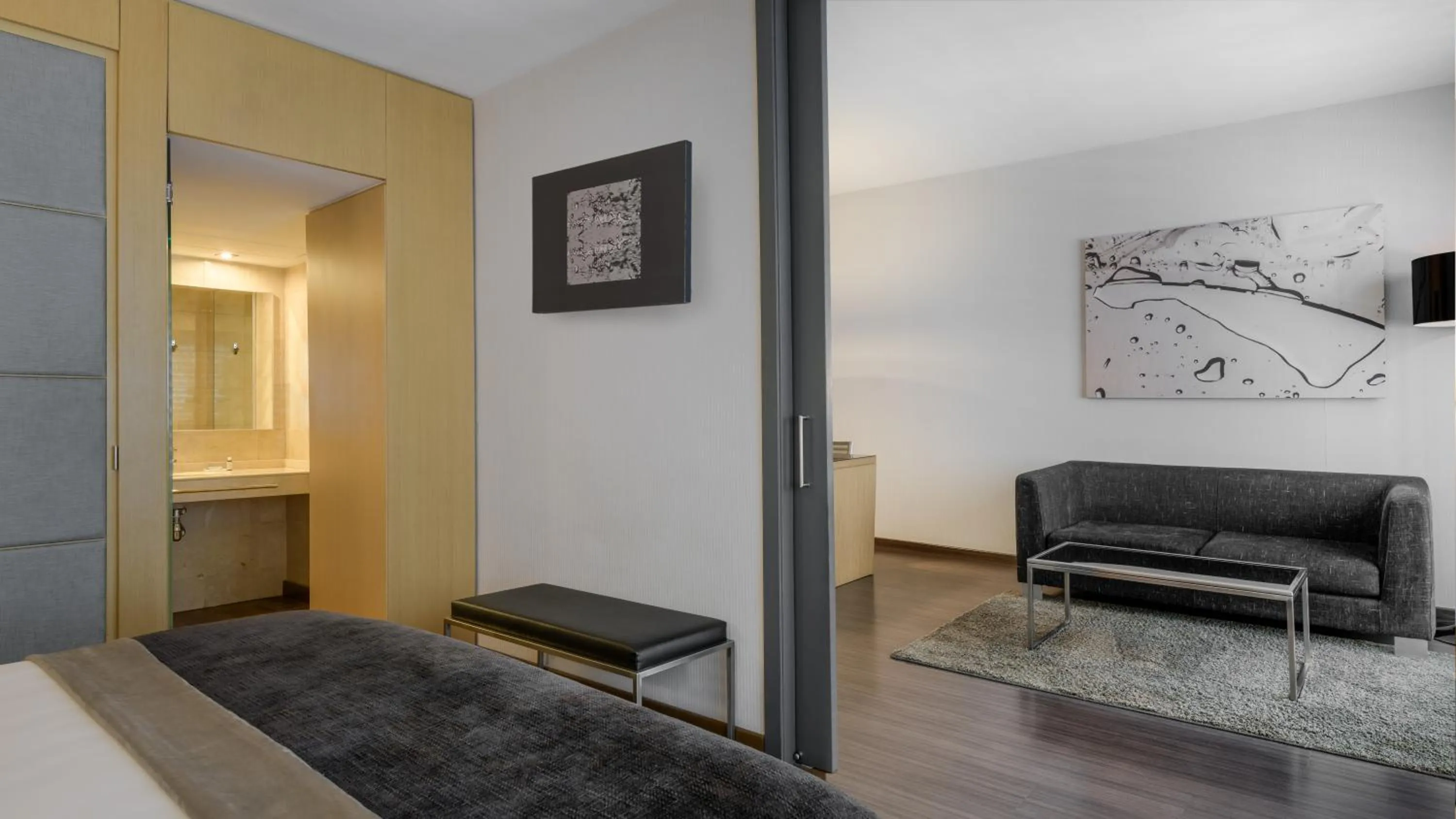 Living room in AC Hotel Victoria Suites by Marriott