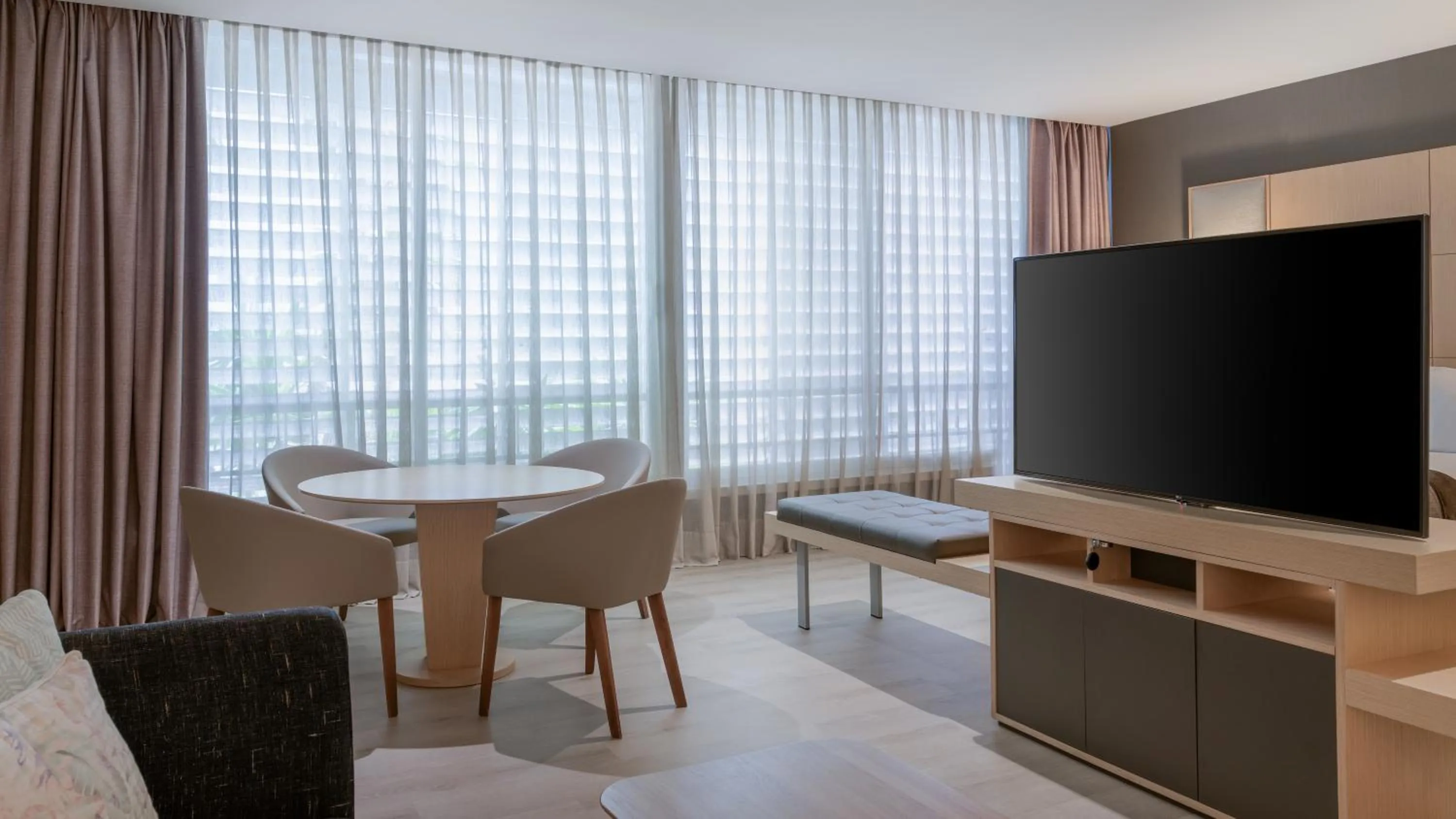 Living room in AC Hotel Victoria Suites by Marriott