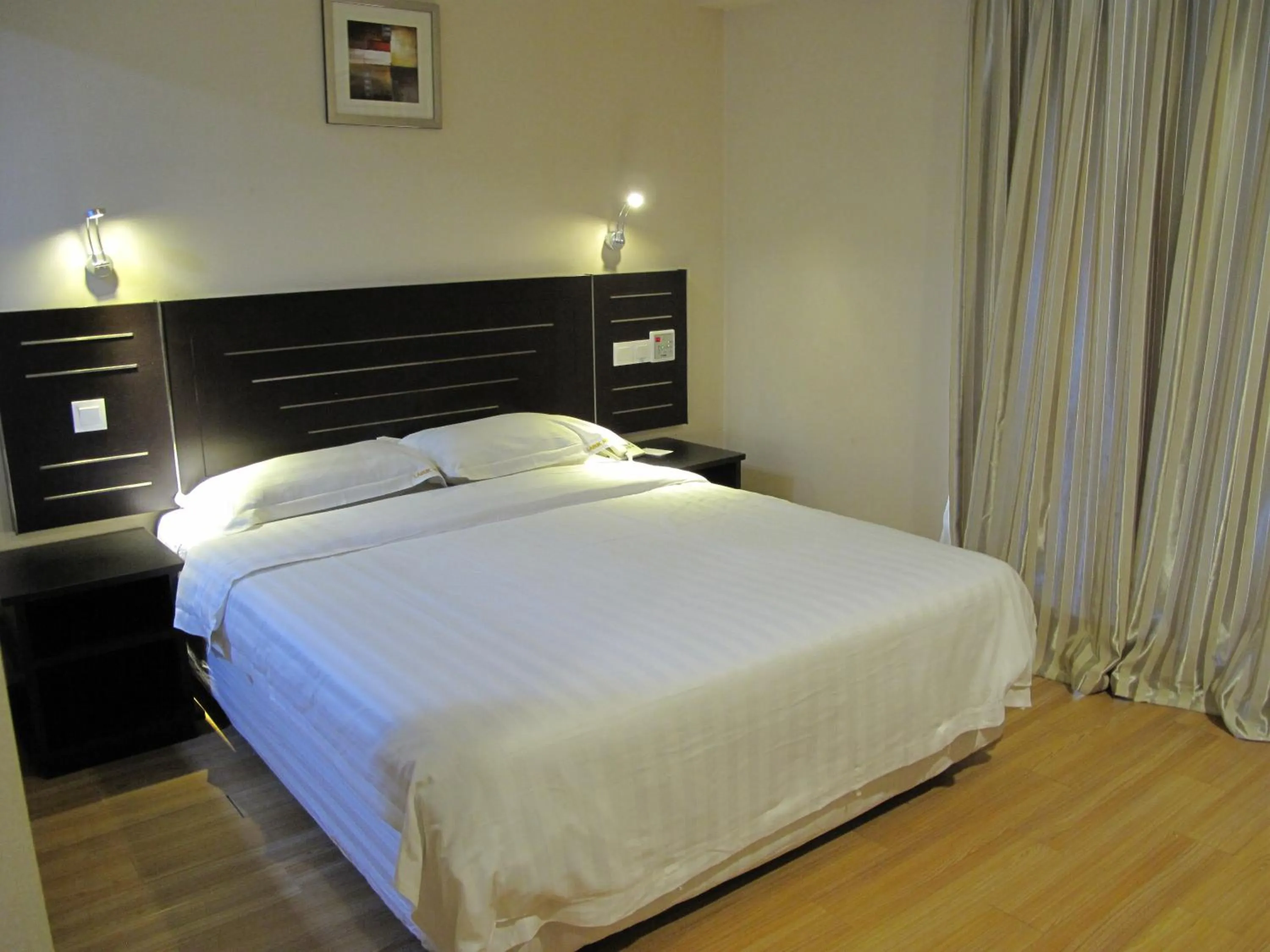 Bed in Labuk Hotel