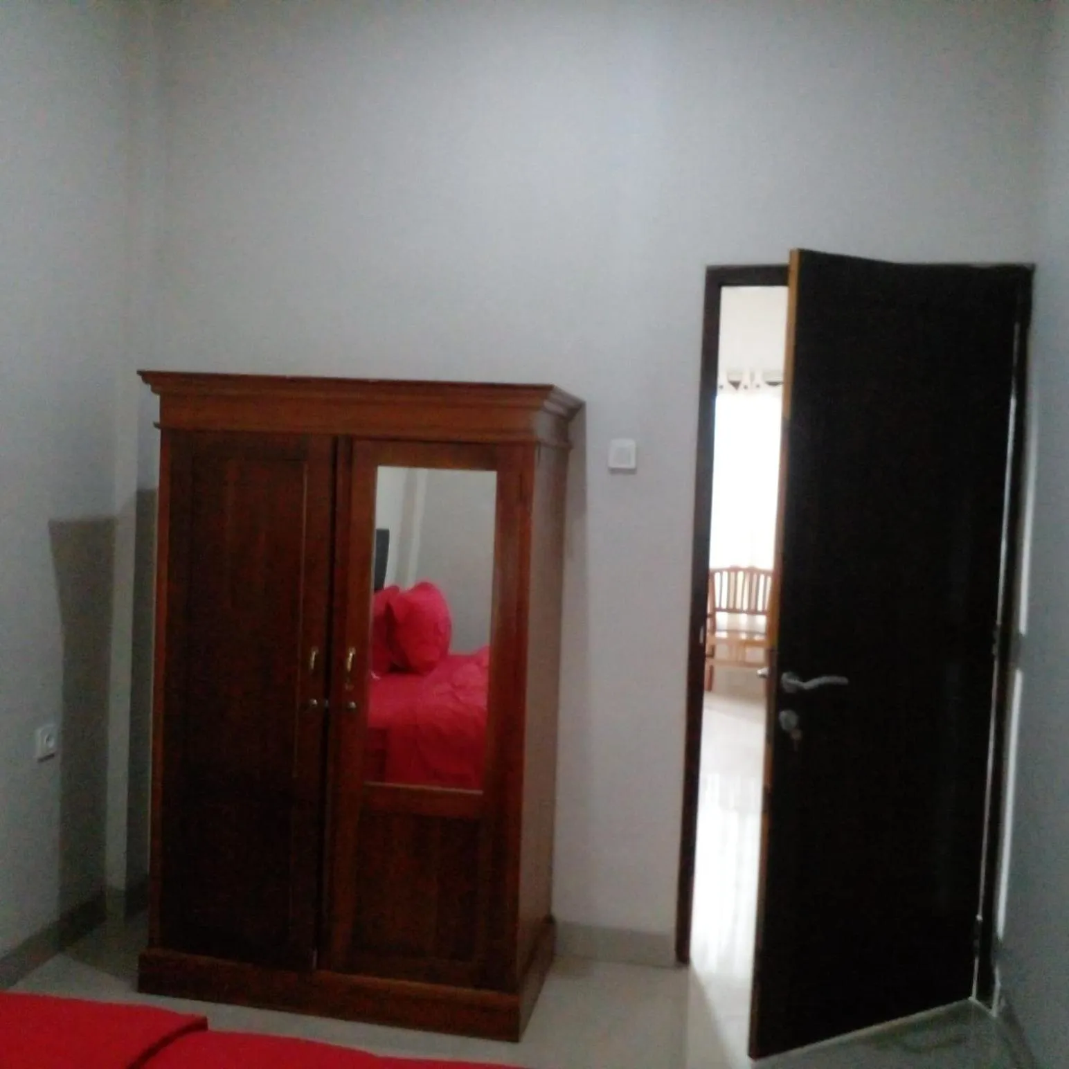 Bedroom in Lembunai By Four-G