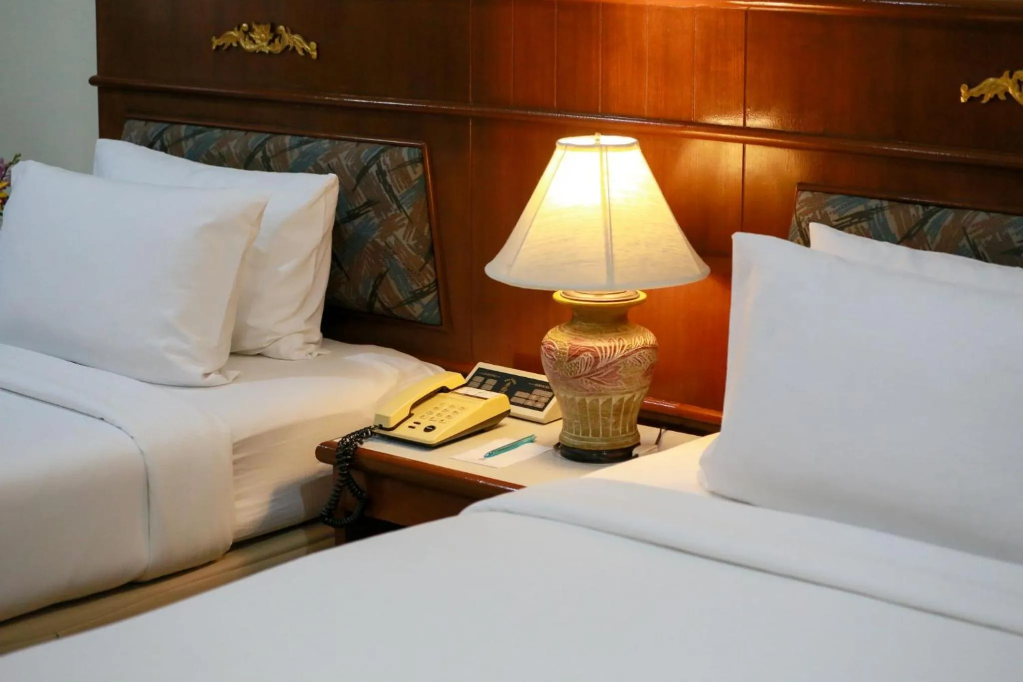 Bed in Star Convention Hotel