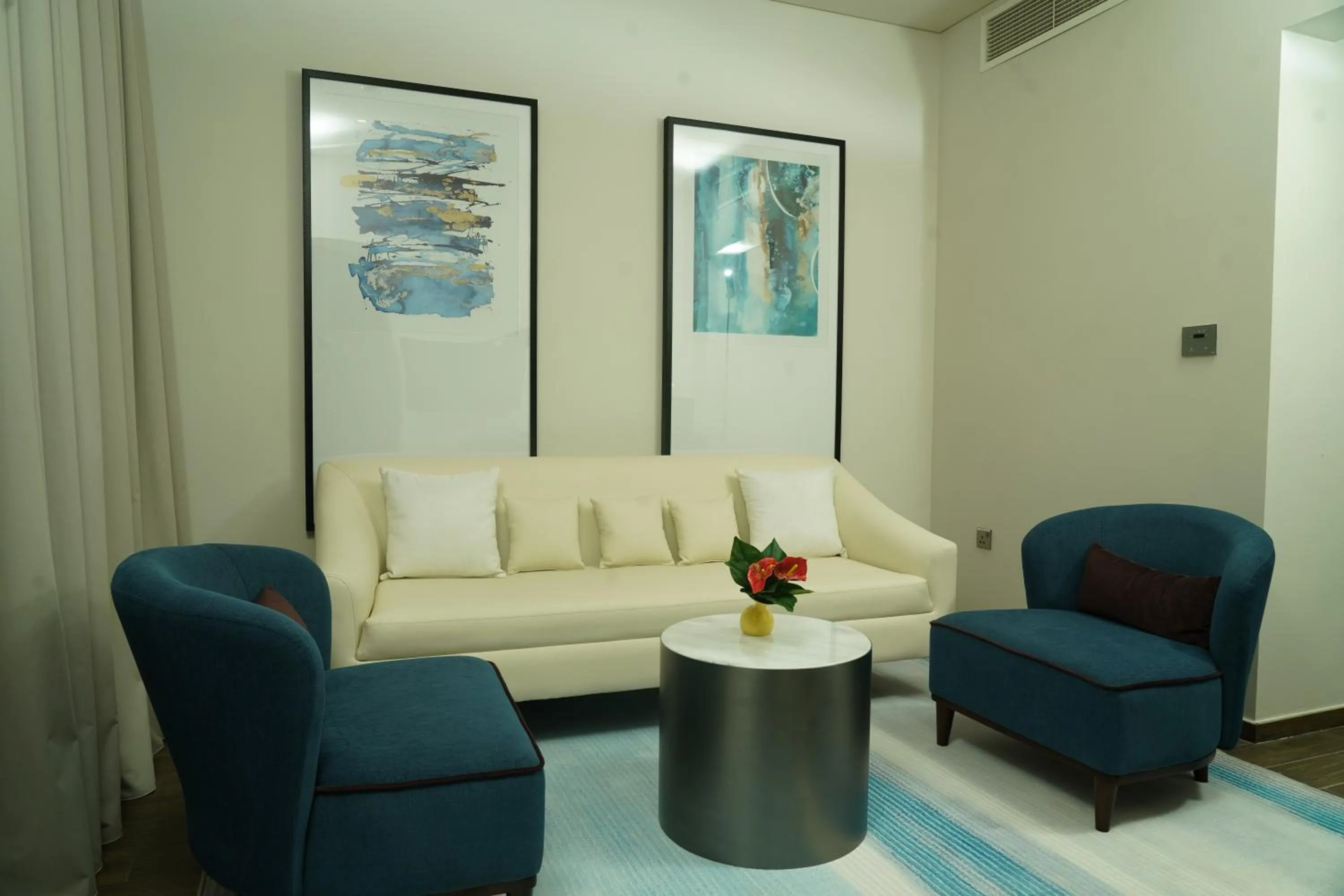 Living room in C - Hotel and Suites Doha