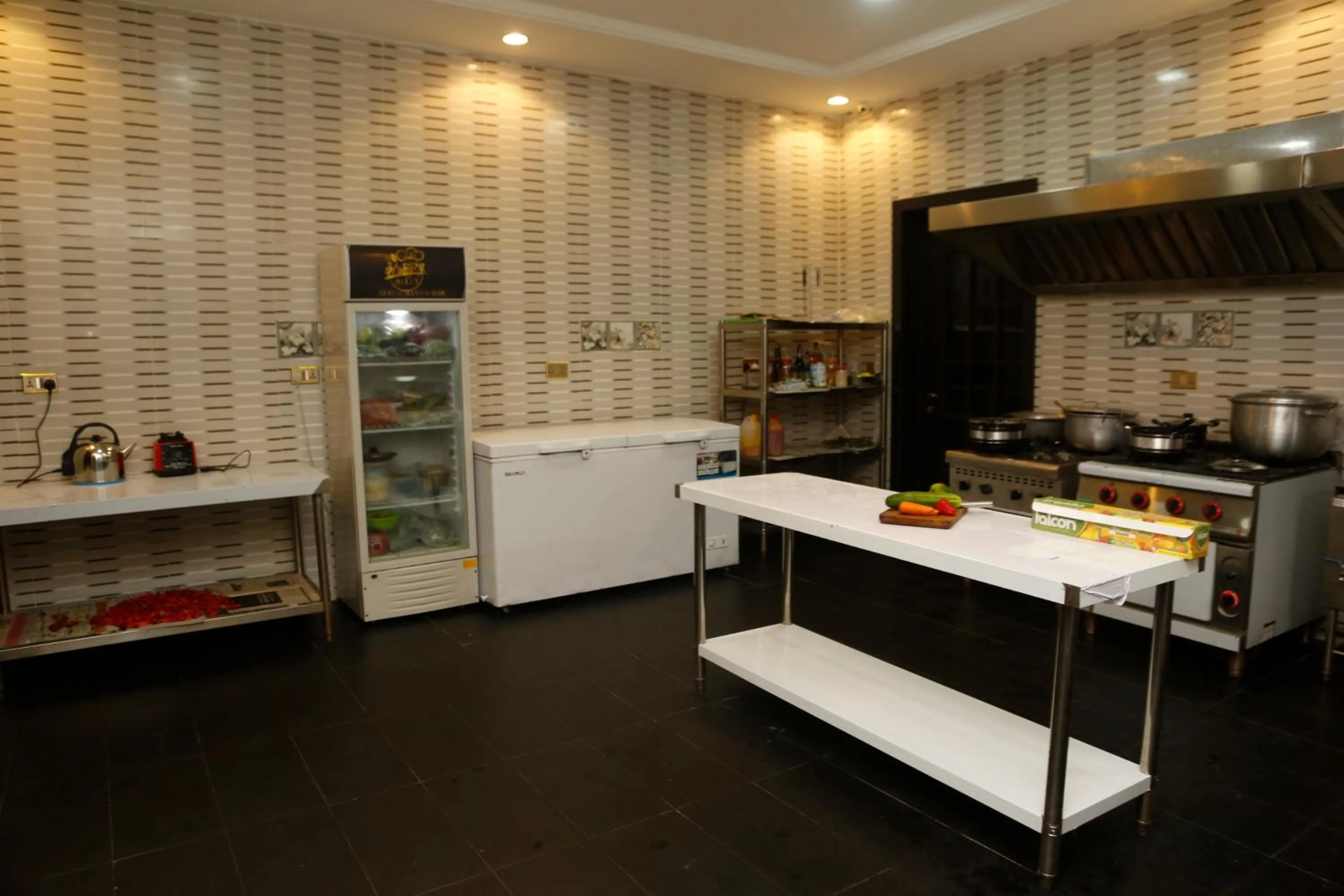 Kitchen or kitchenette in 247 Luxury Hotel & Apartment Ajah