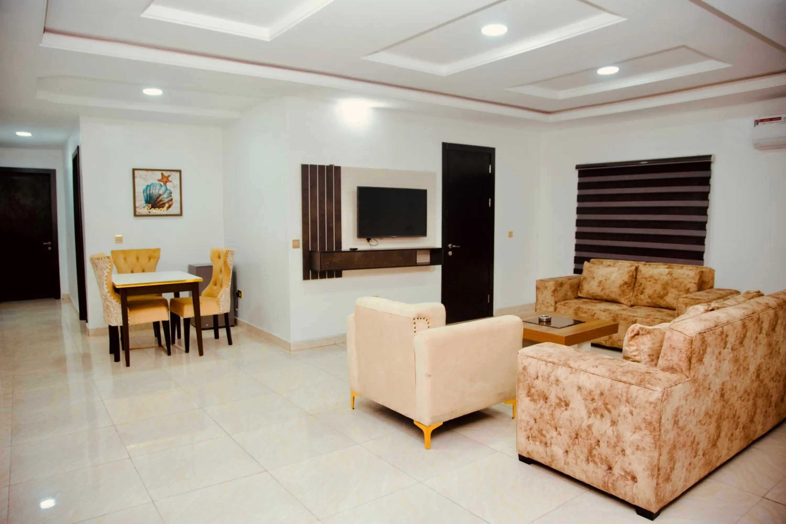 Communal lounge/ TV room in 247 Luxury Hotel & Apartment Ajah