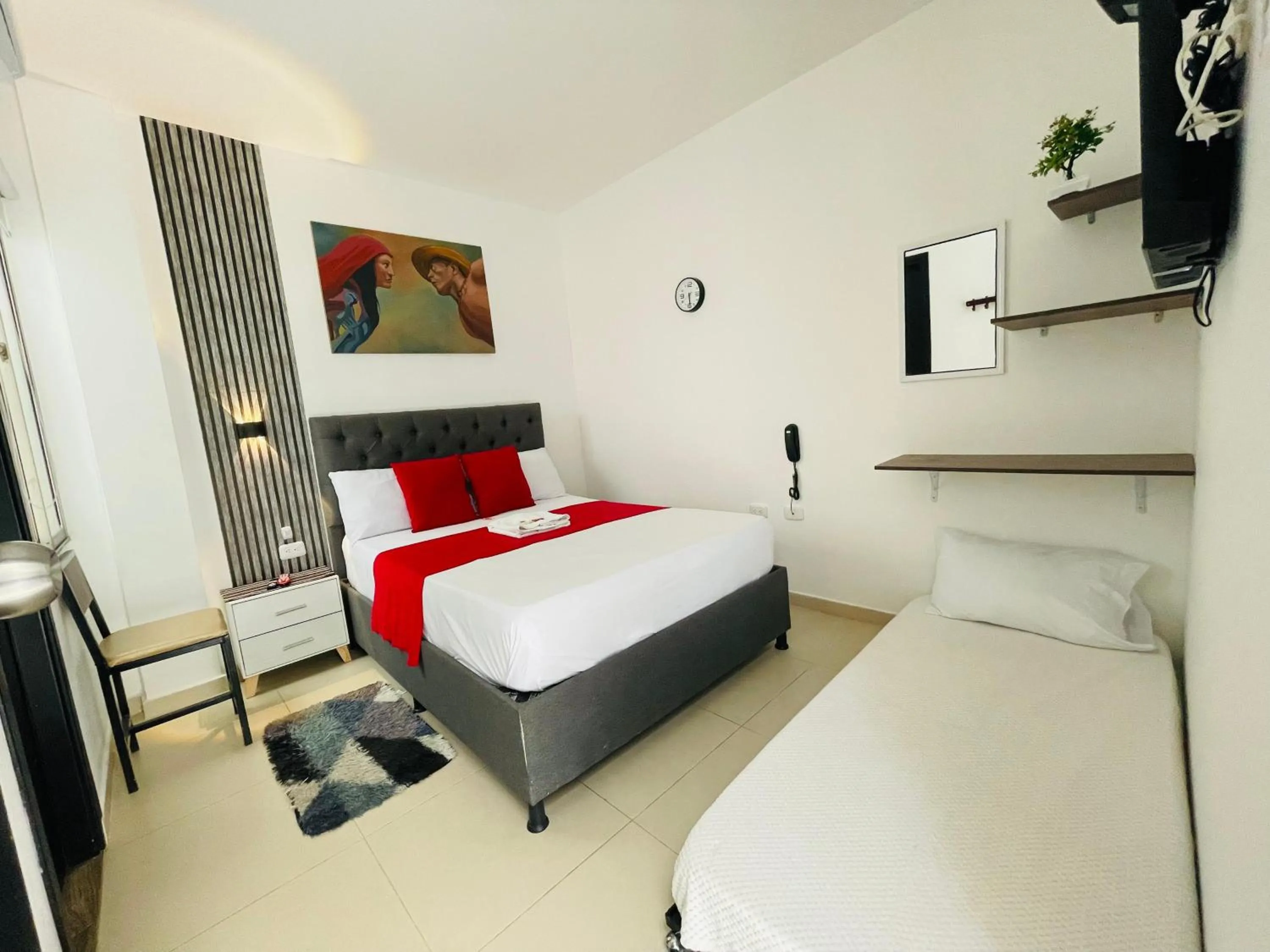 Bed in ANAJIRAWAA HOTEL