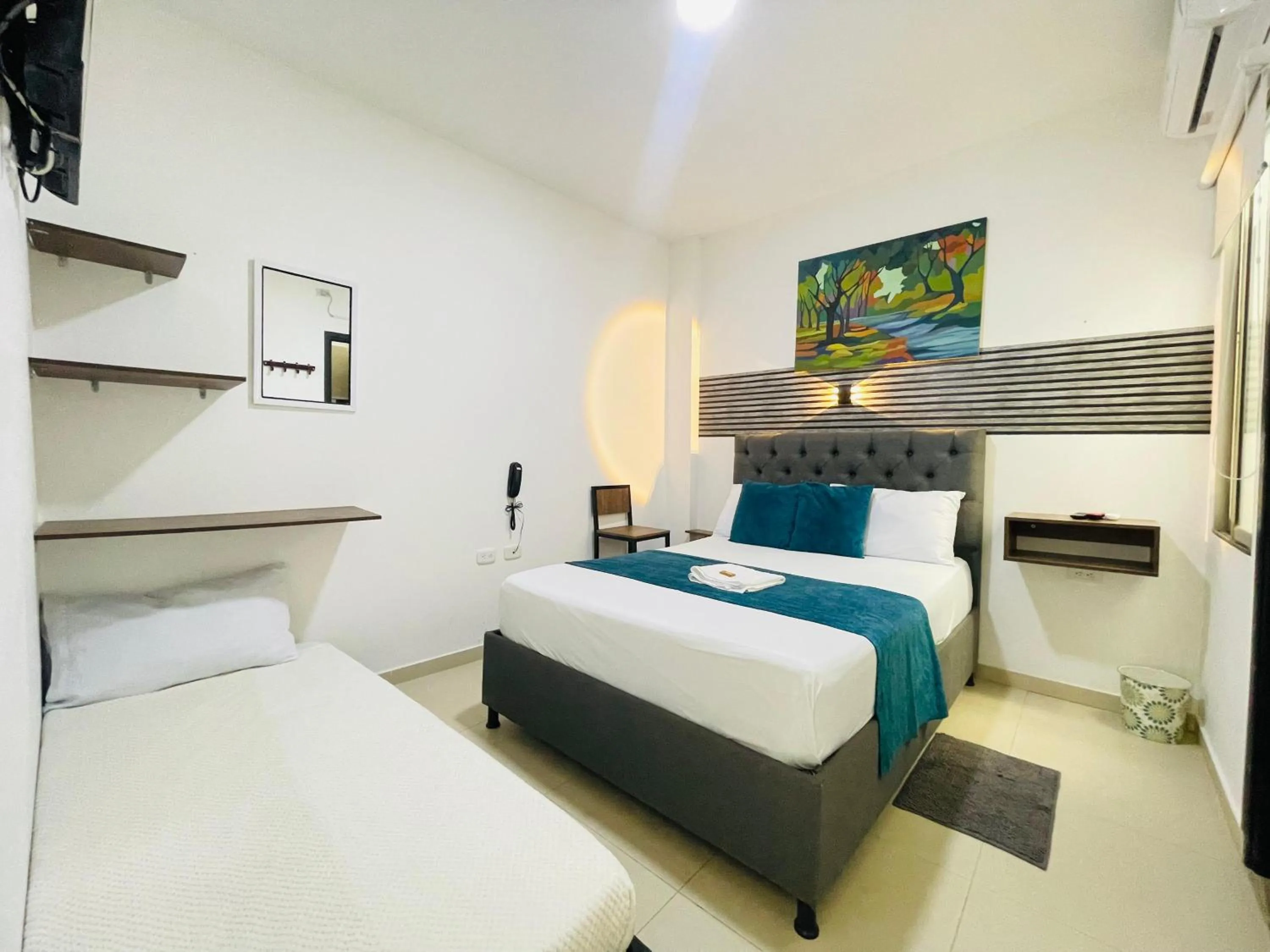 Bed in ANAJIRAWAA HOTEL