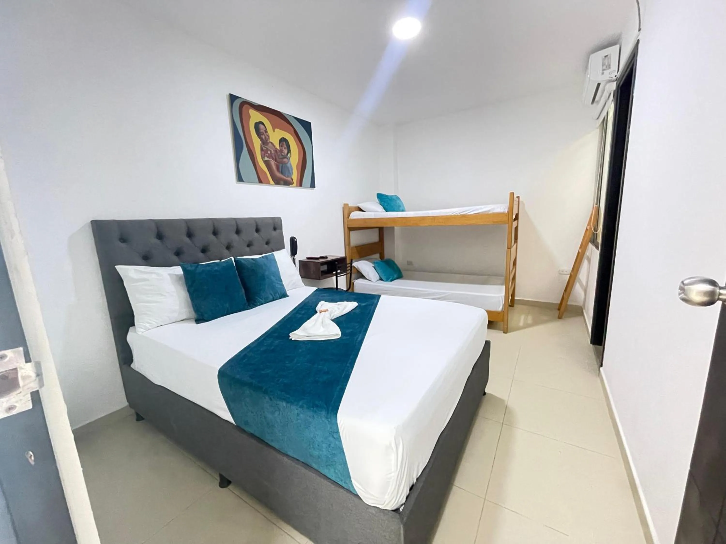 Bed in ANAJIRAWAA HOTEL