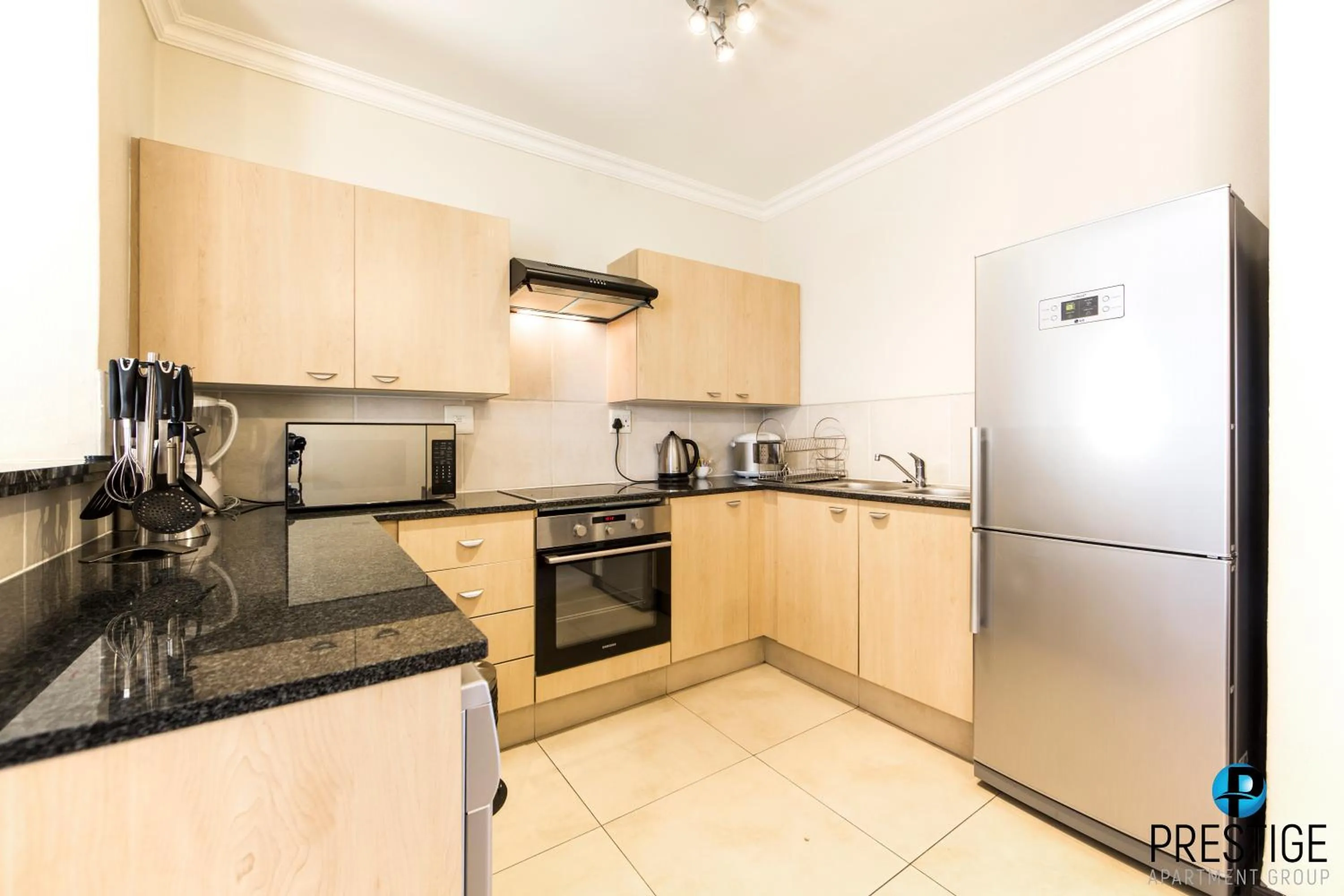 Kitchen or kitchenette in Prestige Apartments Sandton at Westpoint