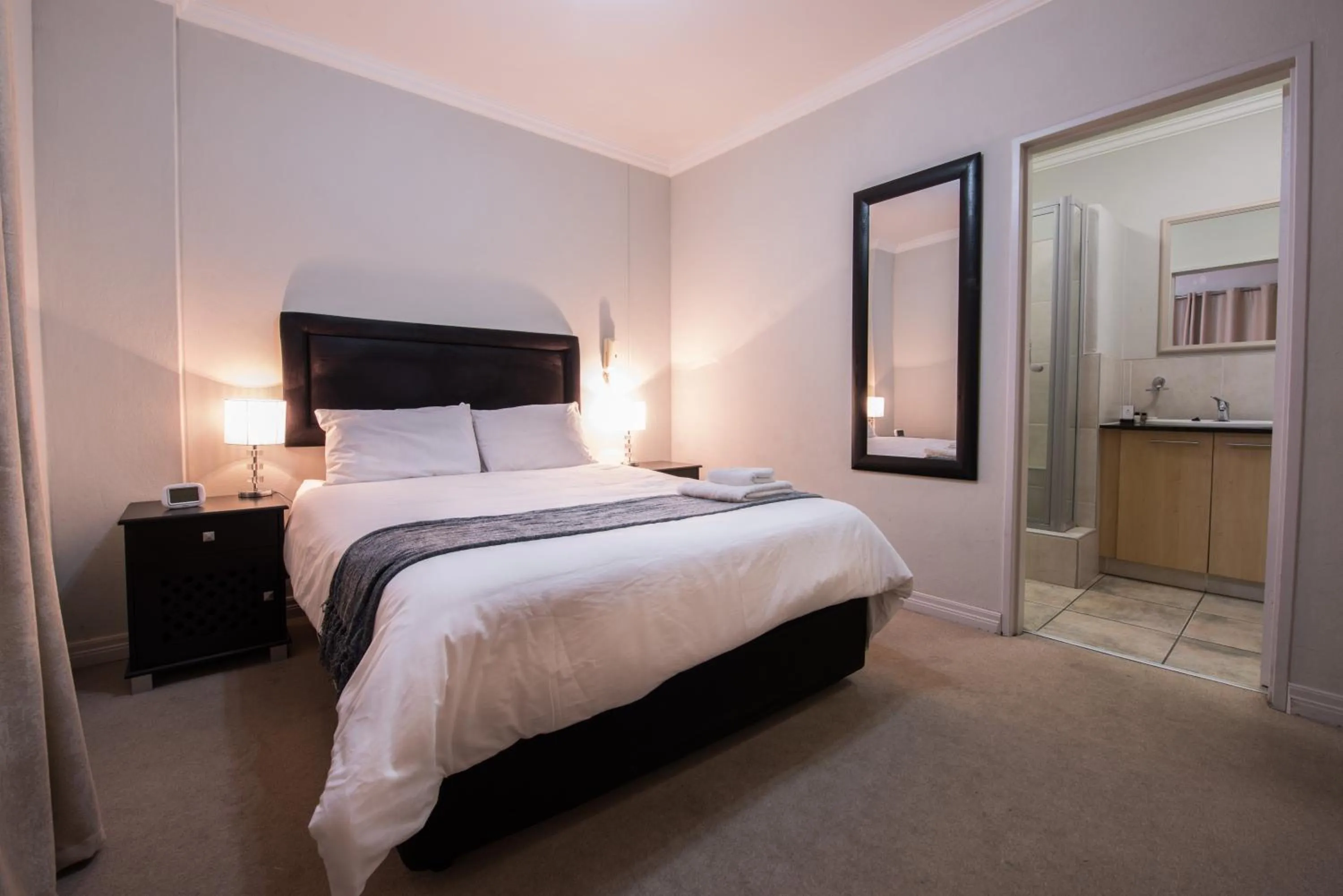 Photo of the whole room, Bed in Prestige Apartments Sandton at Westpoint