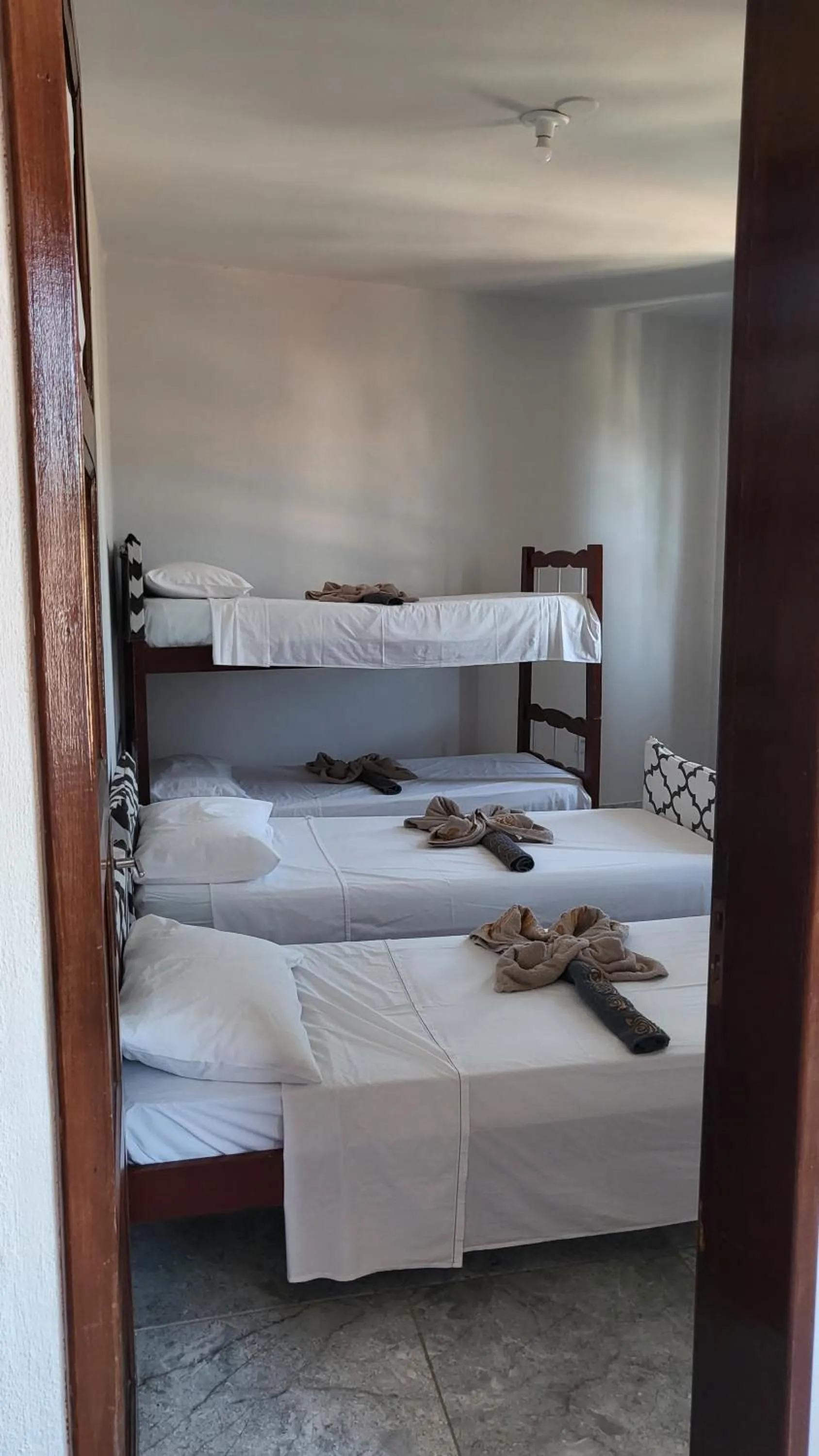 Bed in Tamboleiro's Hotel Residence