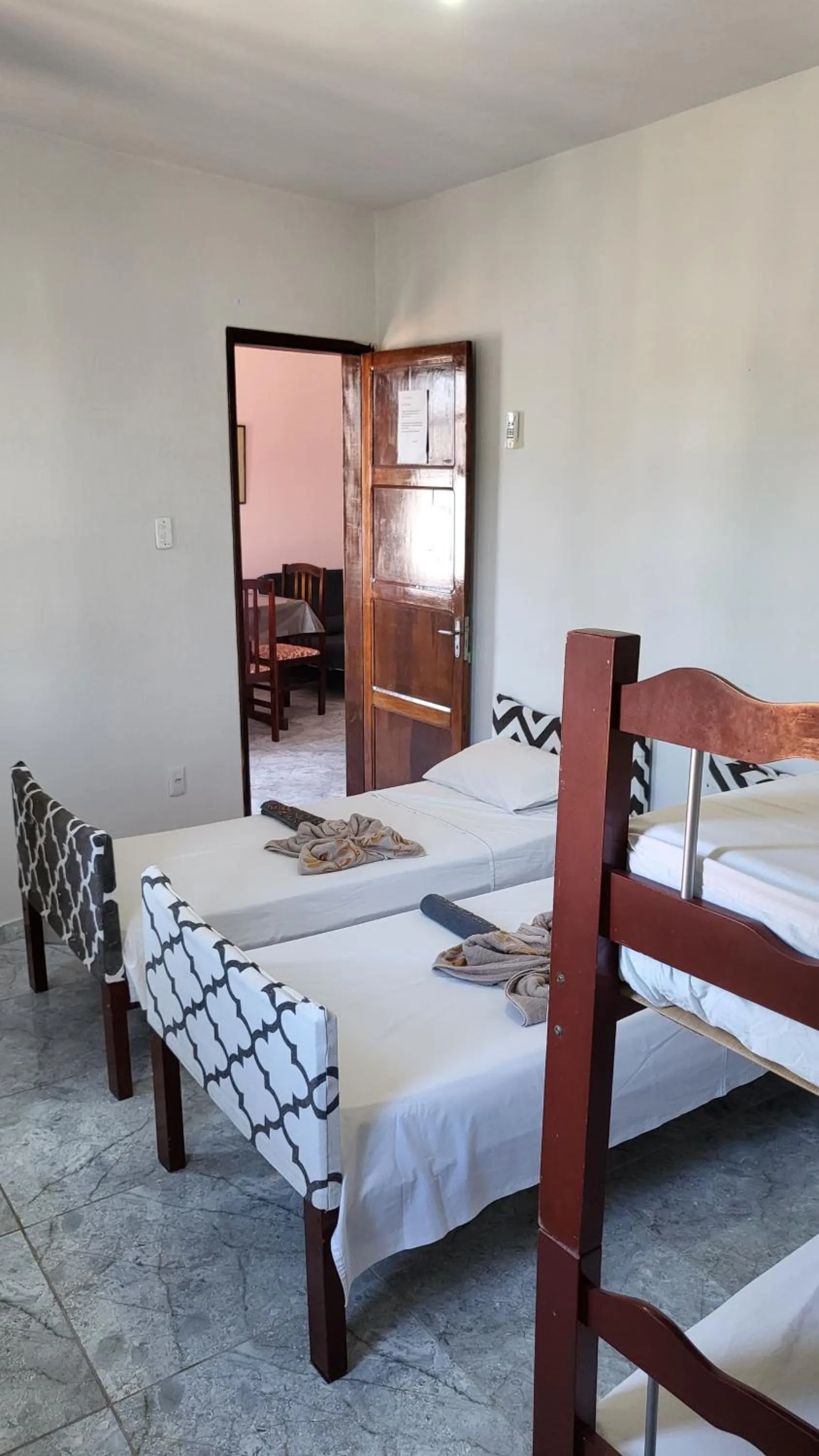 Bed in Tamboleiro's Hotel Residence