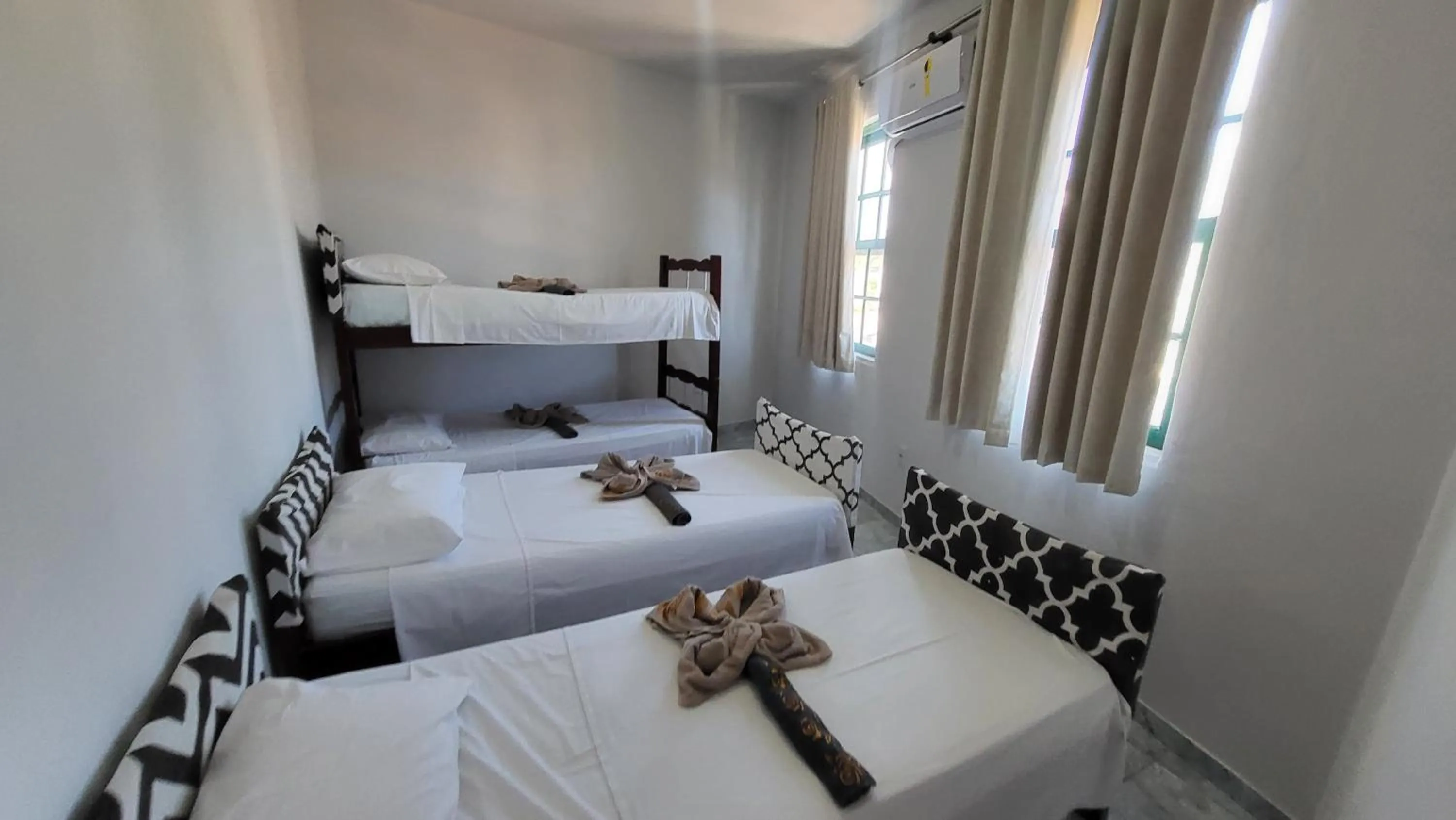 Bed in Tamboleiro's Hotel Residence