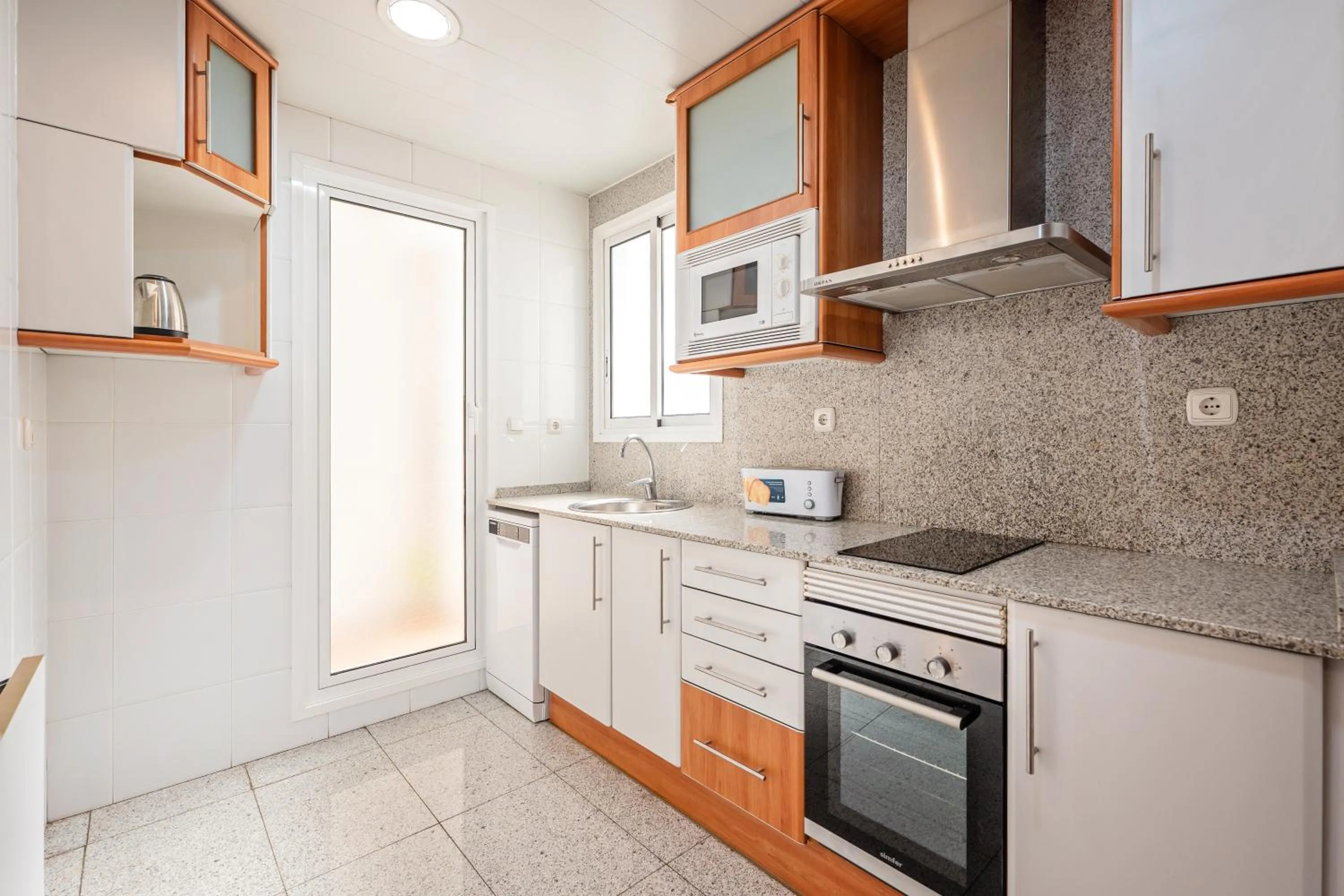Kitchen or kitchenette in Apartaments Marina - Abapart