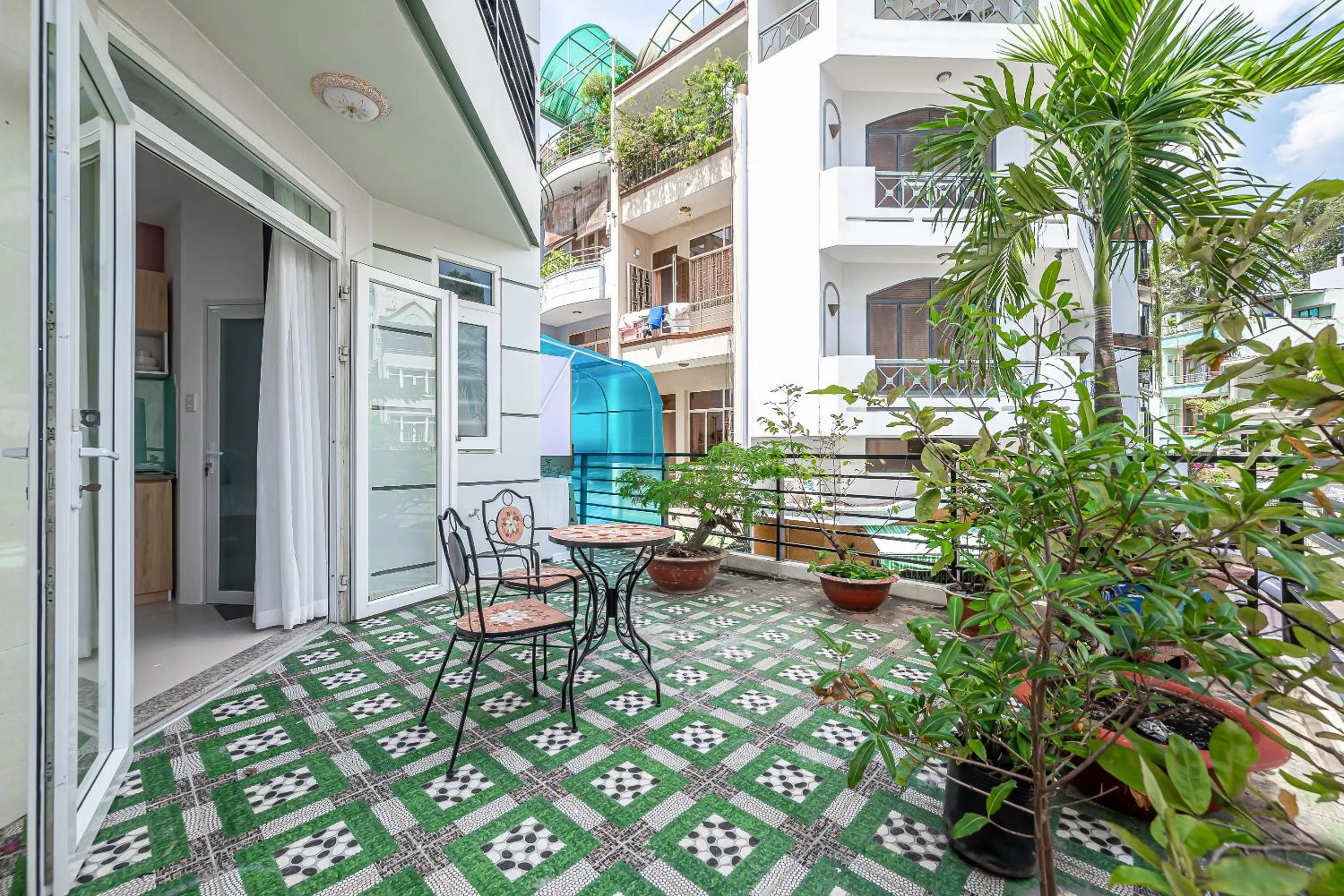 Garden in Cozrum Homes - Retro House