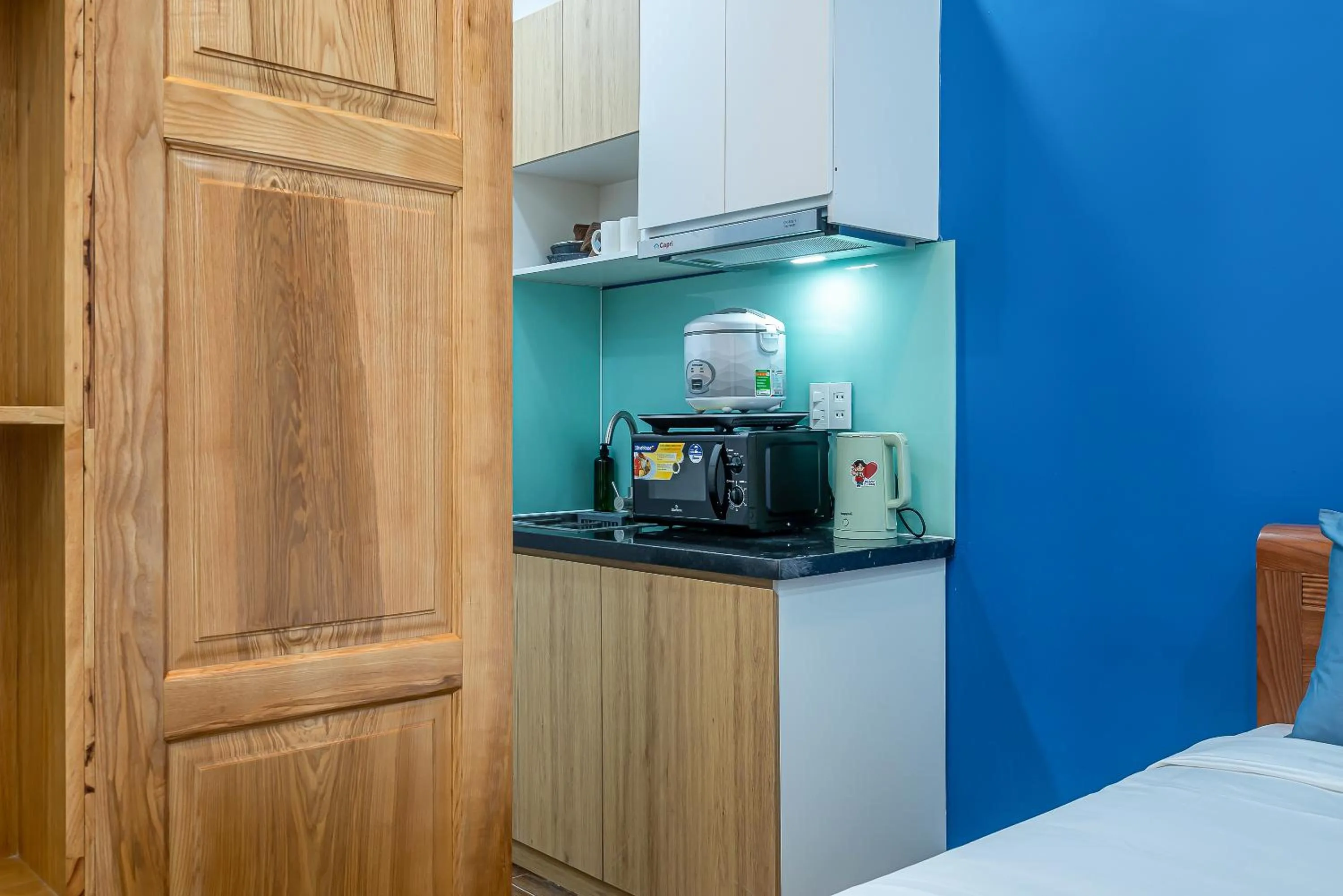 Kitchen or kitchenette, Bed in Cozrum Homes - Retro House