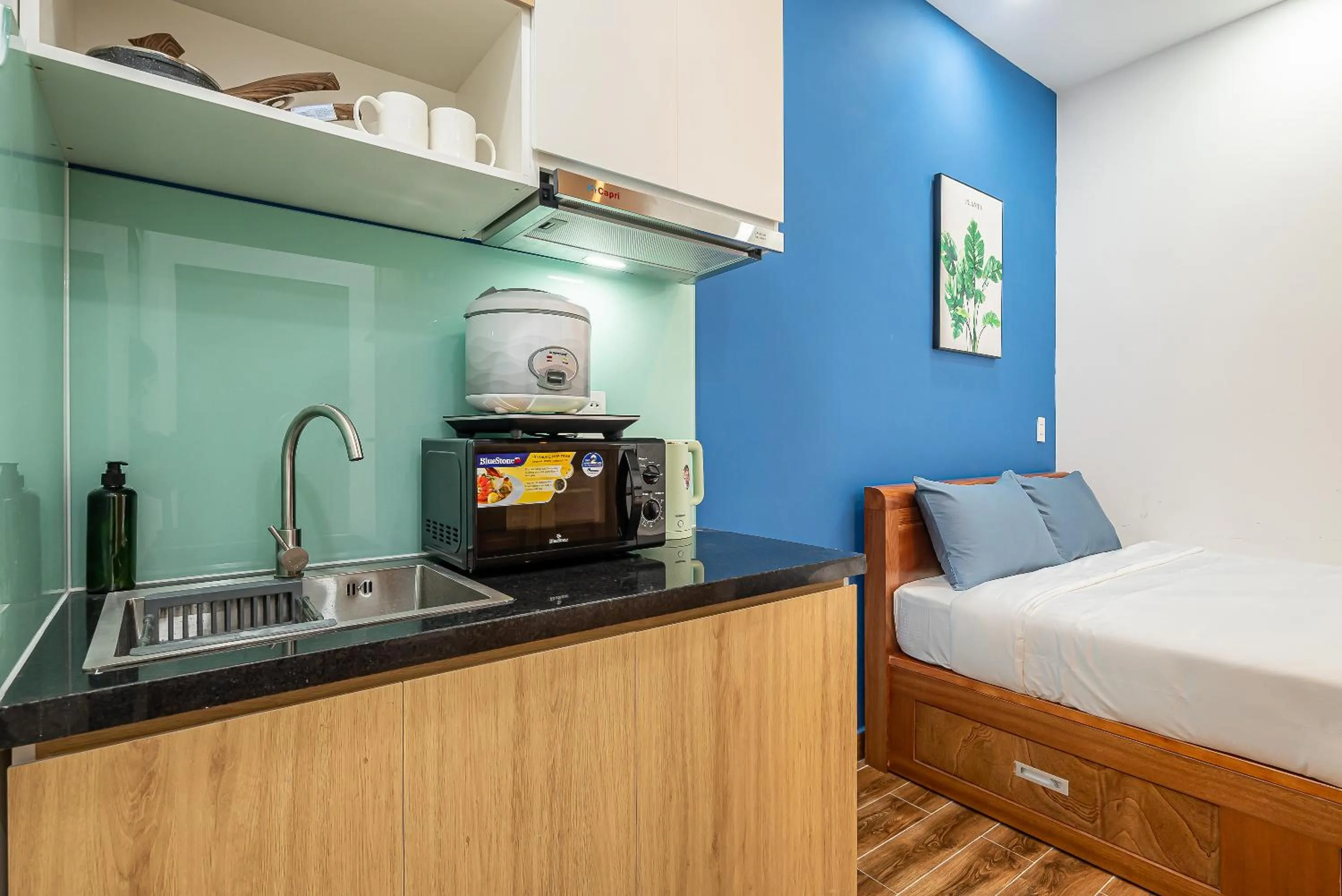 Kitchen or kitchenette, Bed in Cozrum Homes - Retro House