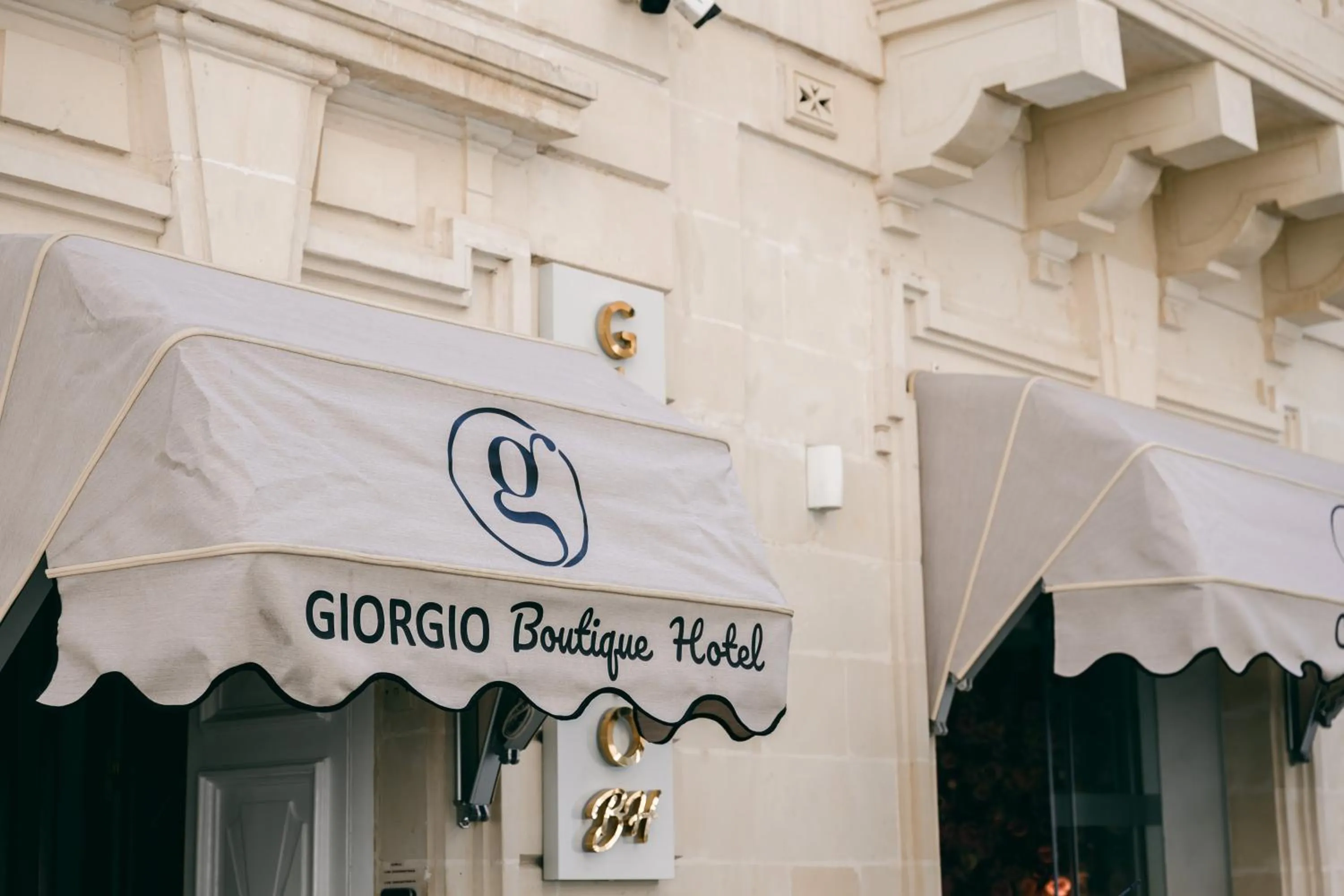 Property logo or sign in Giorgio Boutique Hotel