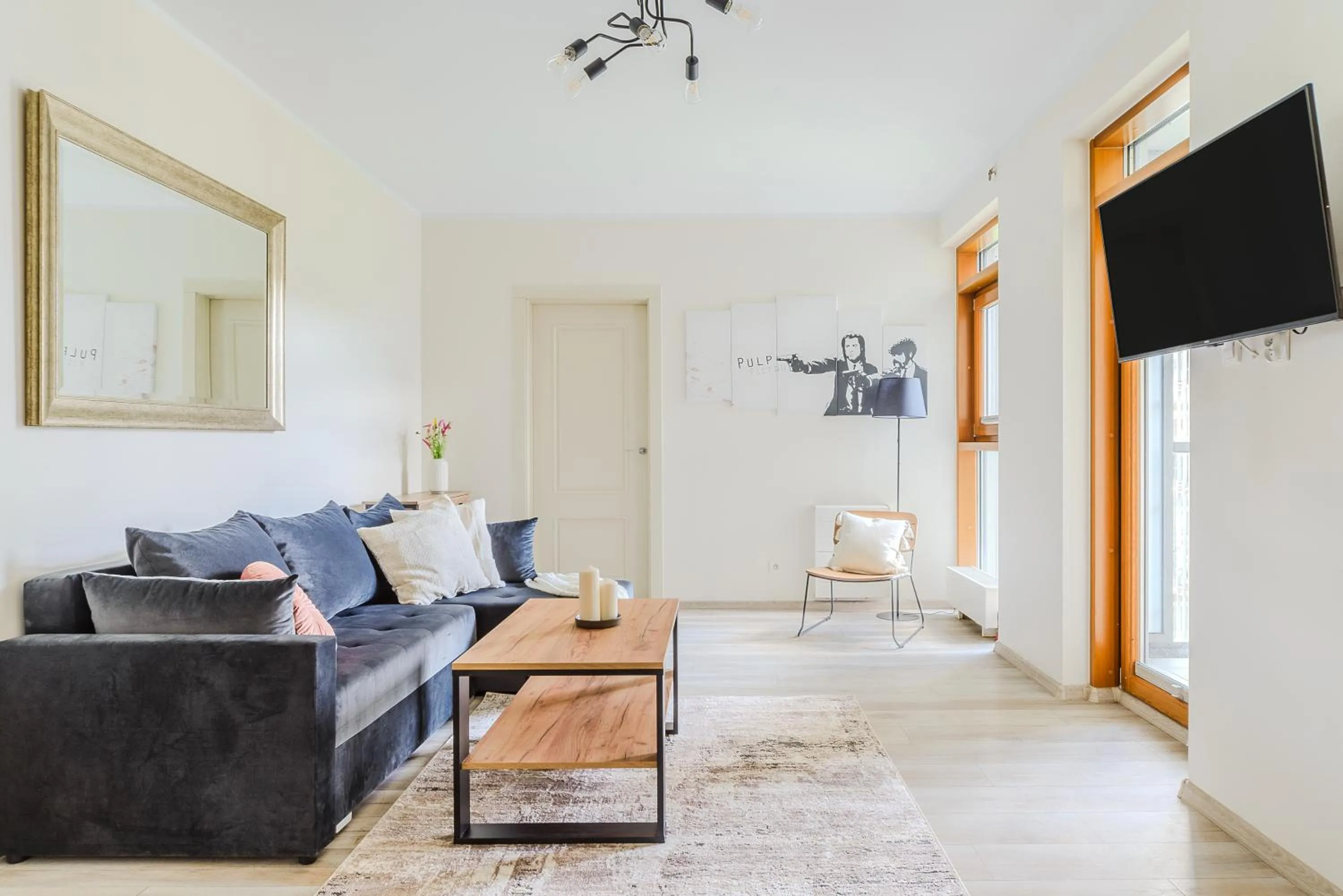 Living room in Slominskiego 7 P&O Apartments