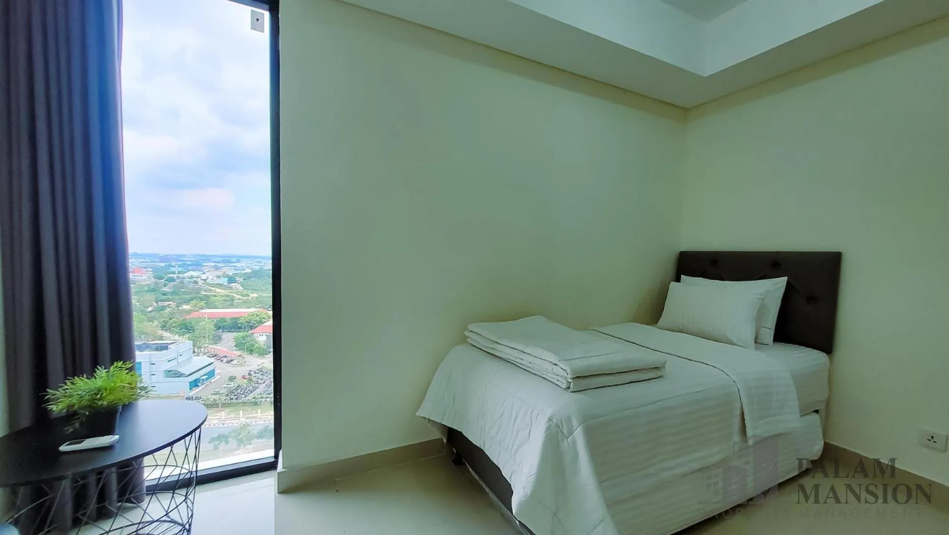 Bed in Palam Mansion at Meisterstadt Pollux Habibie Apartment