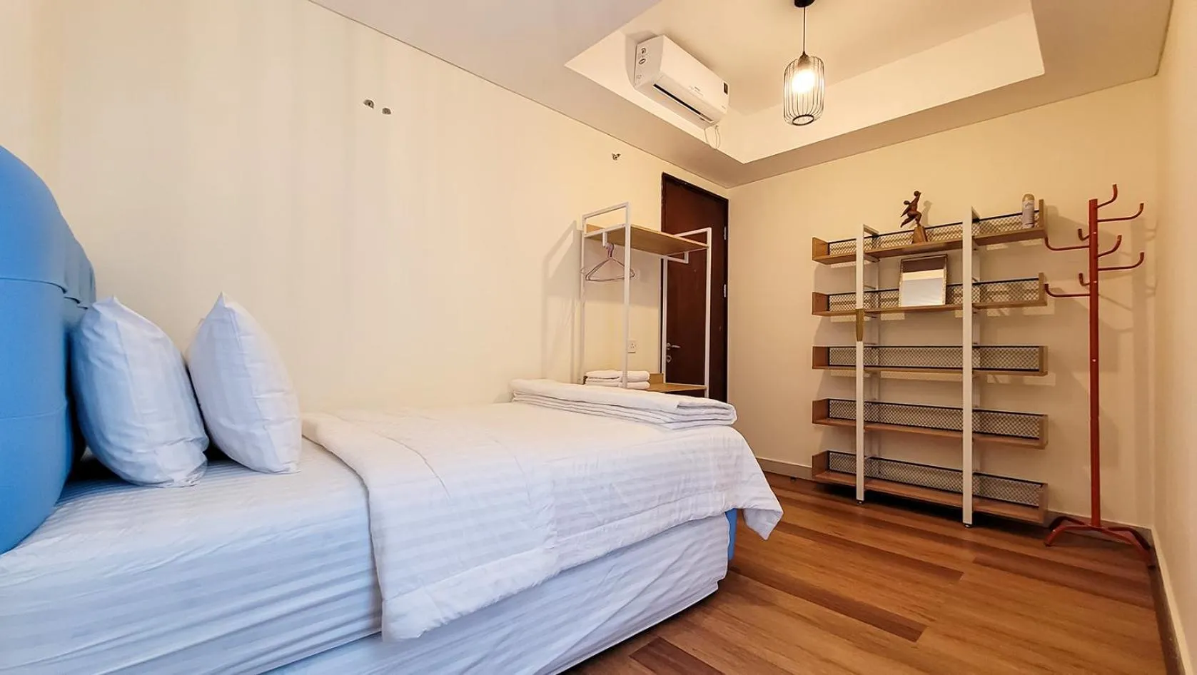 Bed in Palam Mansion at Meisterstadt Pollux Habibie Apartment