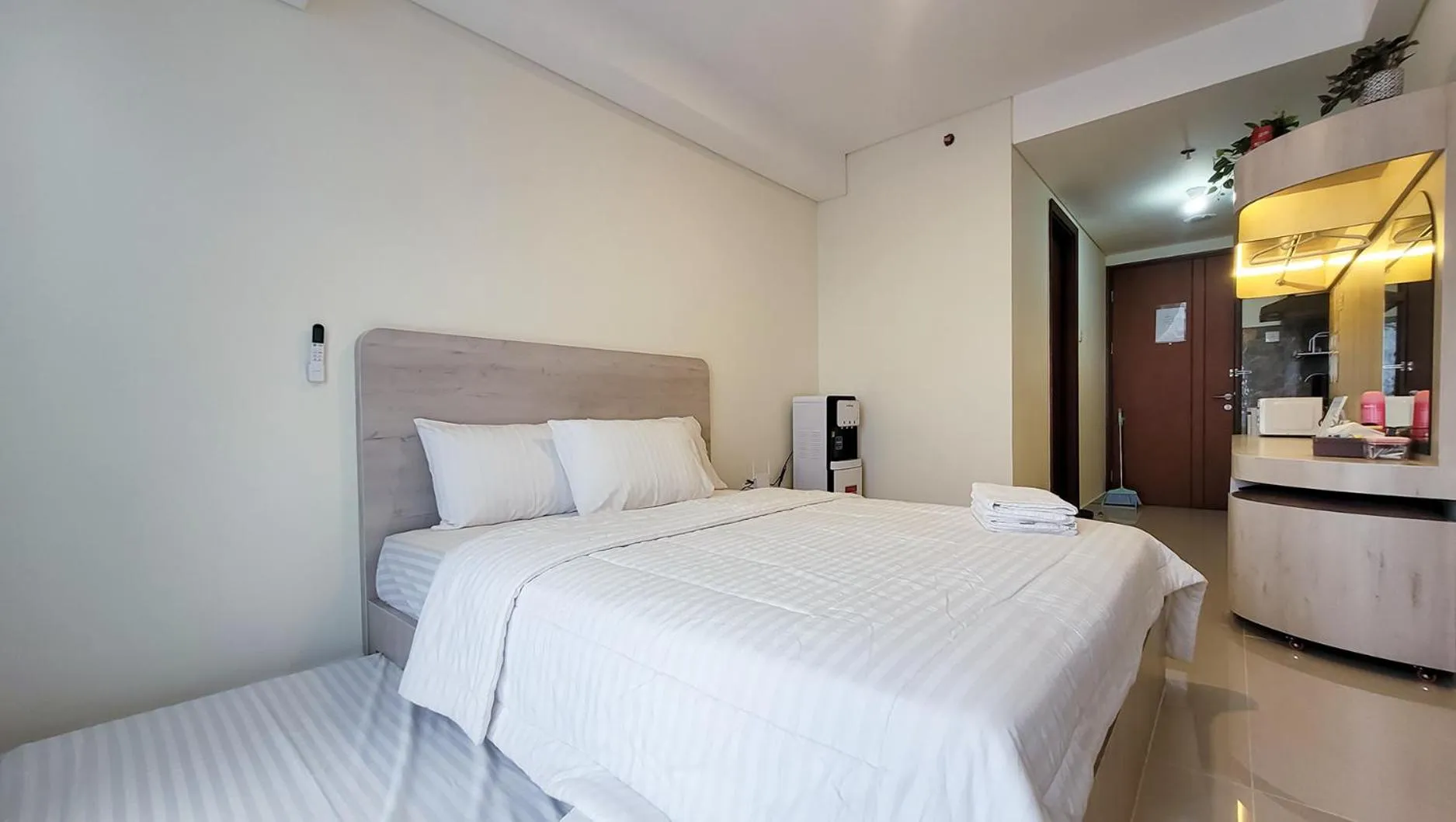 Bed in Palam Mansion at Meisterstadt Pollux Habibie Apartment