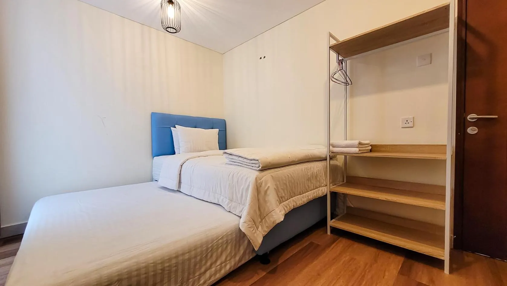 Bed in Palam Mansion at Meisterstadt Pollux Habibie Apartment