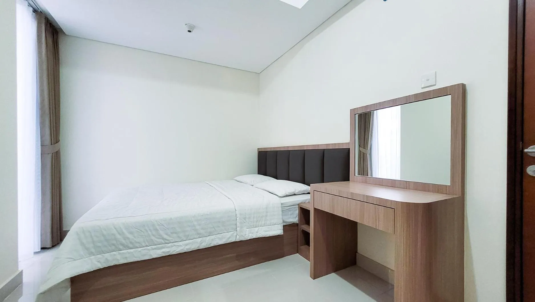 Bed in Palam Mansion at Meisterstadt Pollux Habibie Apartment