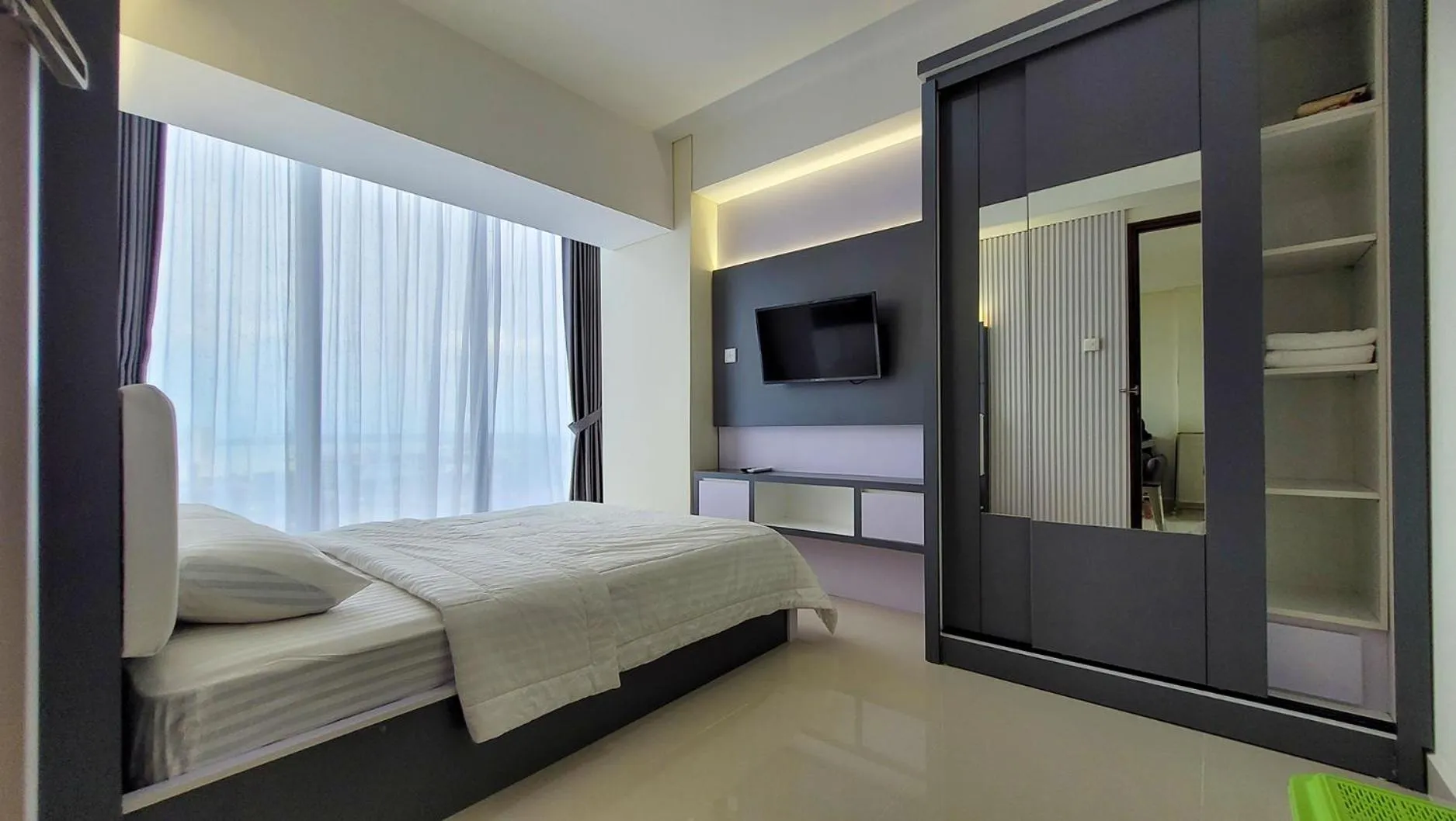 Bed in Palam Mansion at Meisterstadt Pollux Habibie Apartment