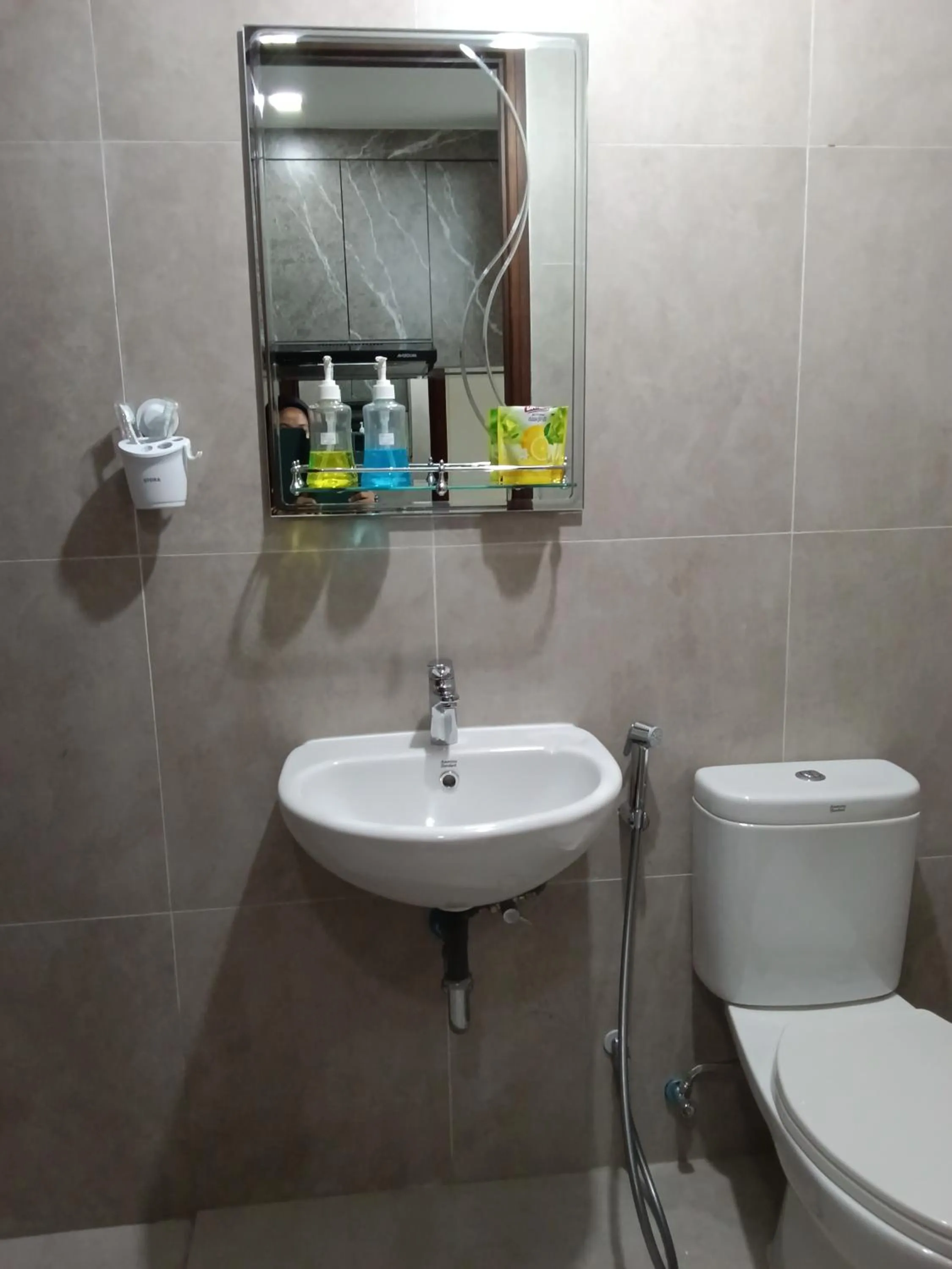 Bathroom in Palam Mansion at Meisterstadt Pollux Habibie Apartment