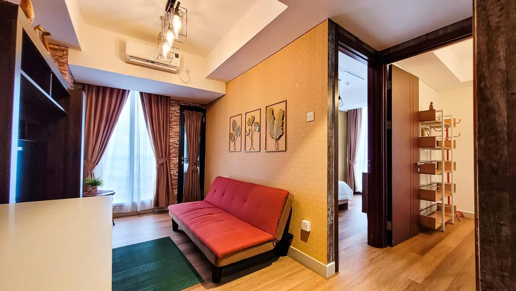 Living room, Bed in Palam Mansion at Meisterstadt Pollux Habibie Apartment