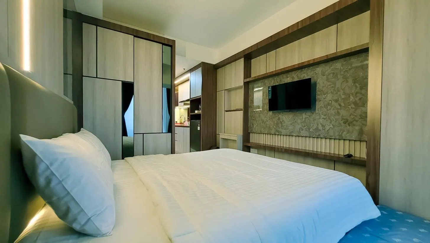 Bed in Palam Mansion at Meisterstadt Pollux Habibie Apartment